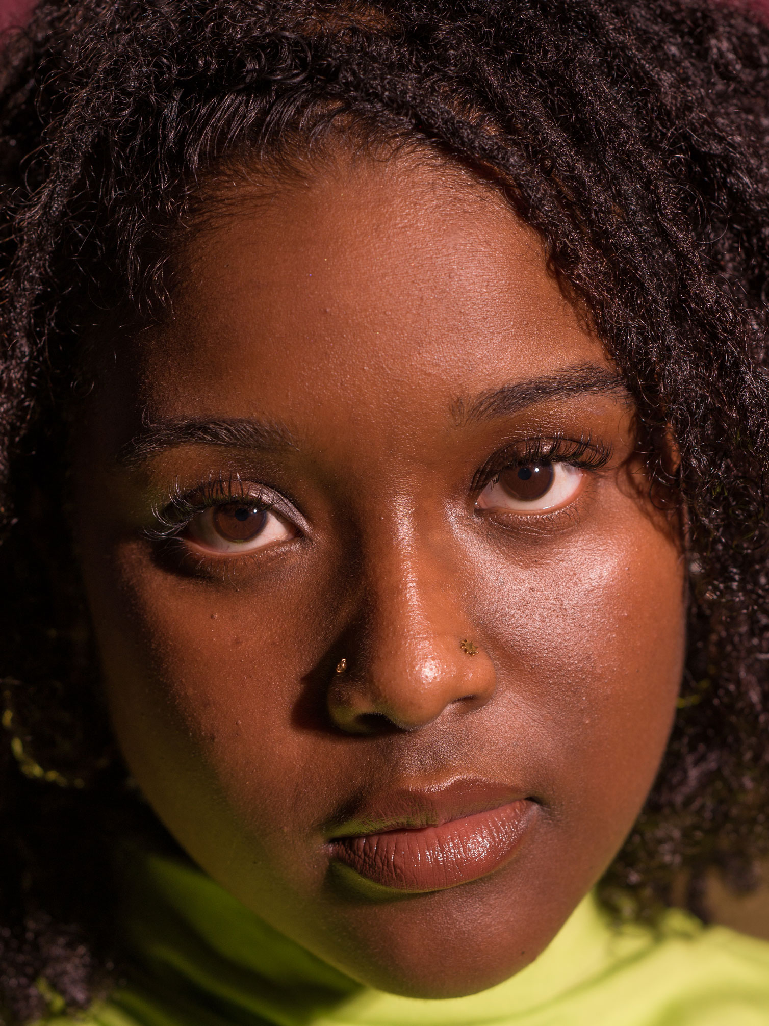 Close-up portrait of a person using catch light by Kaylah Sambo on a Hasselblad X1D-50c.