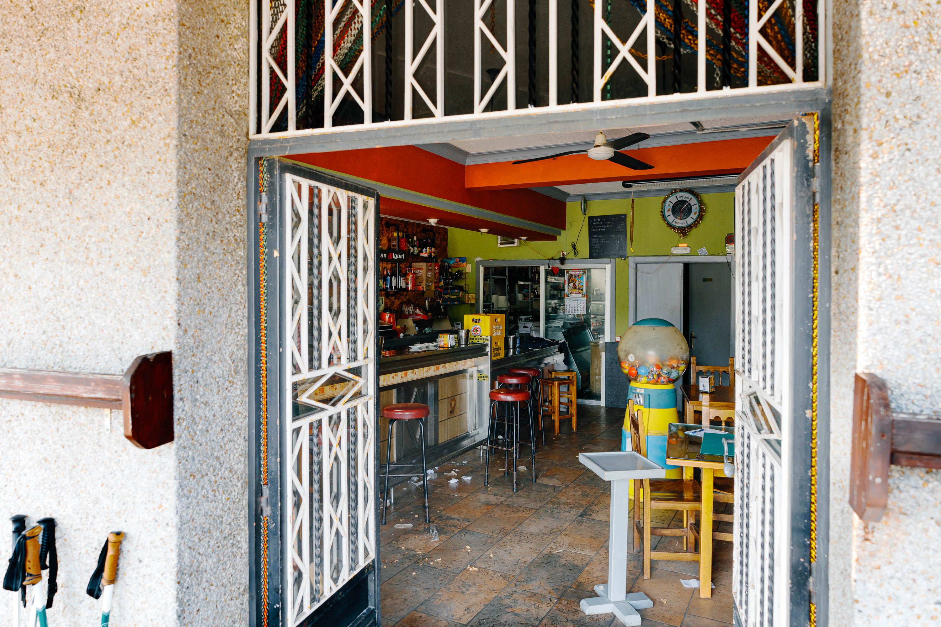 The inside of a messy bar somewhere outside of Lugo, Spain. Taken by Connor Redmond on the Sony A7C II. 
