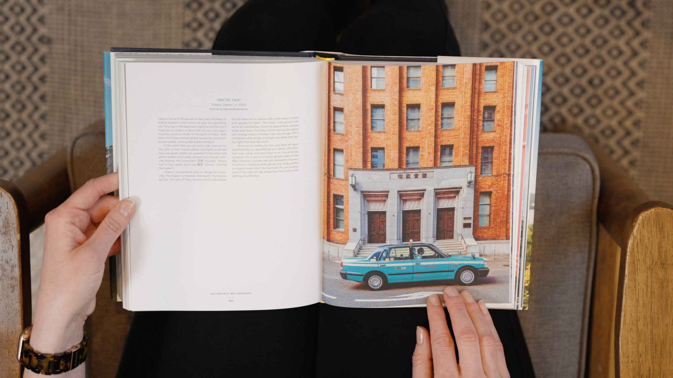 A photo of a cyan-colored car from the Accidentally Wes Anderson book.