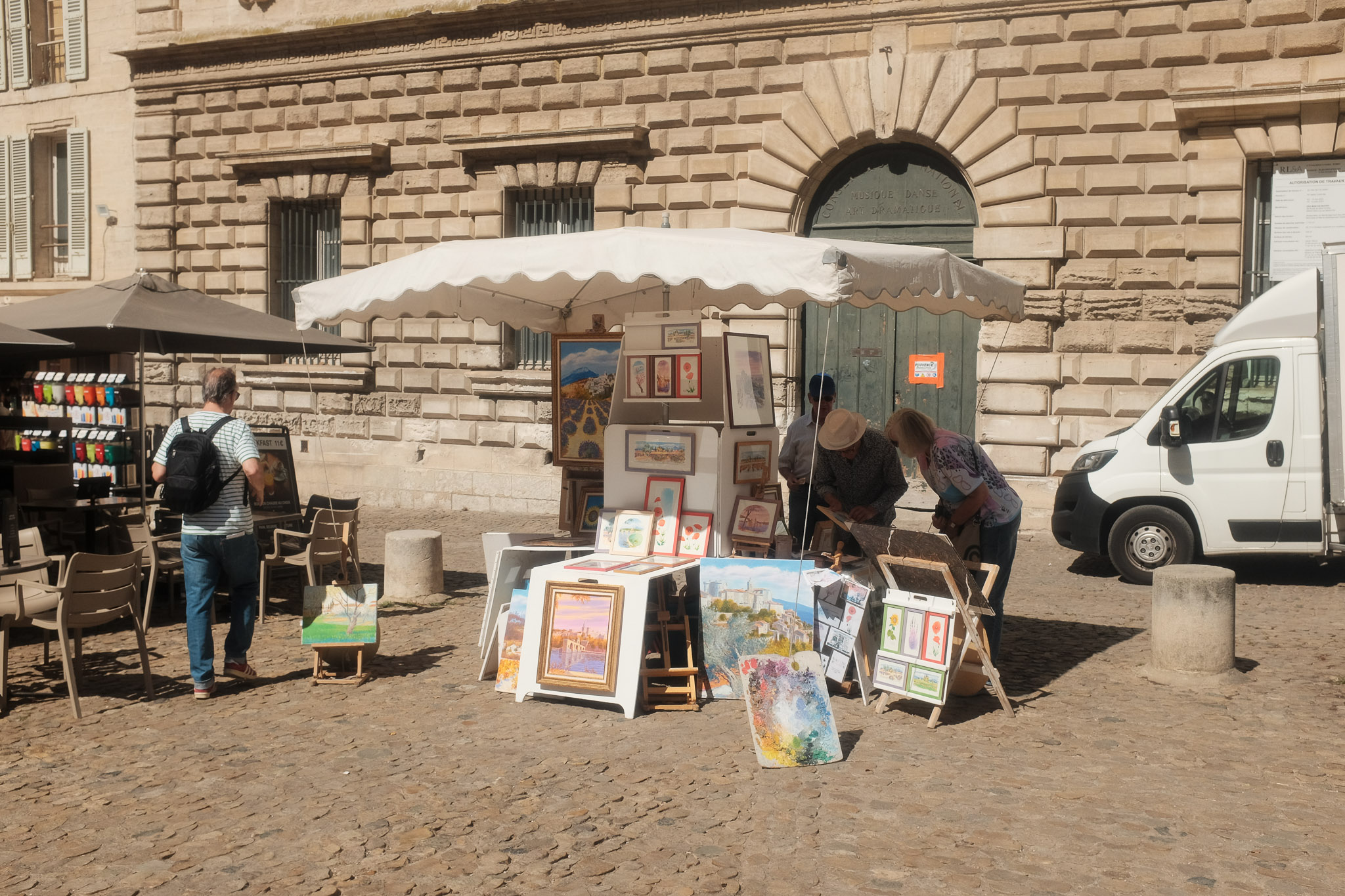 A market stall selling paintings in Aix-en-provence. Taken on the Fujifilm X100T by Connor Redmond.