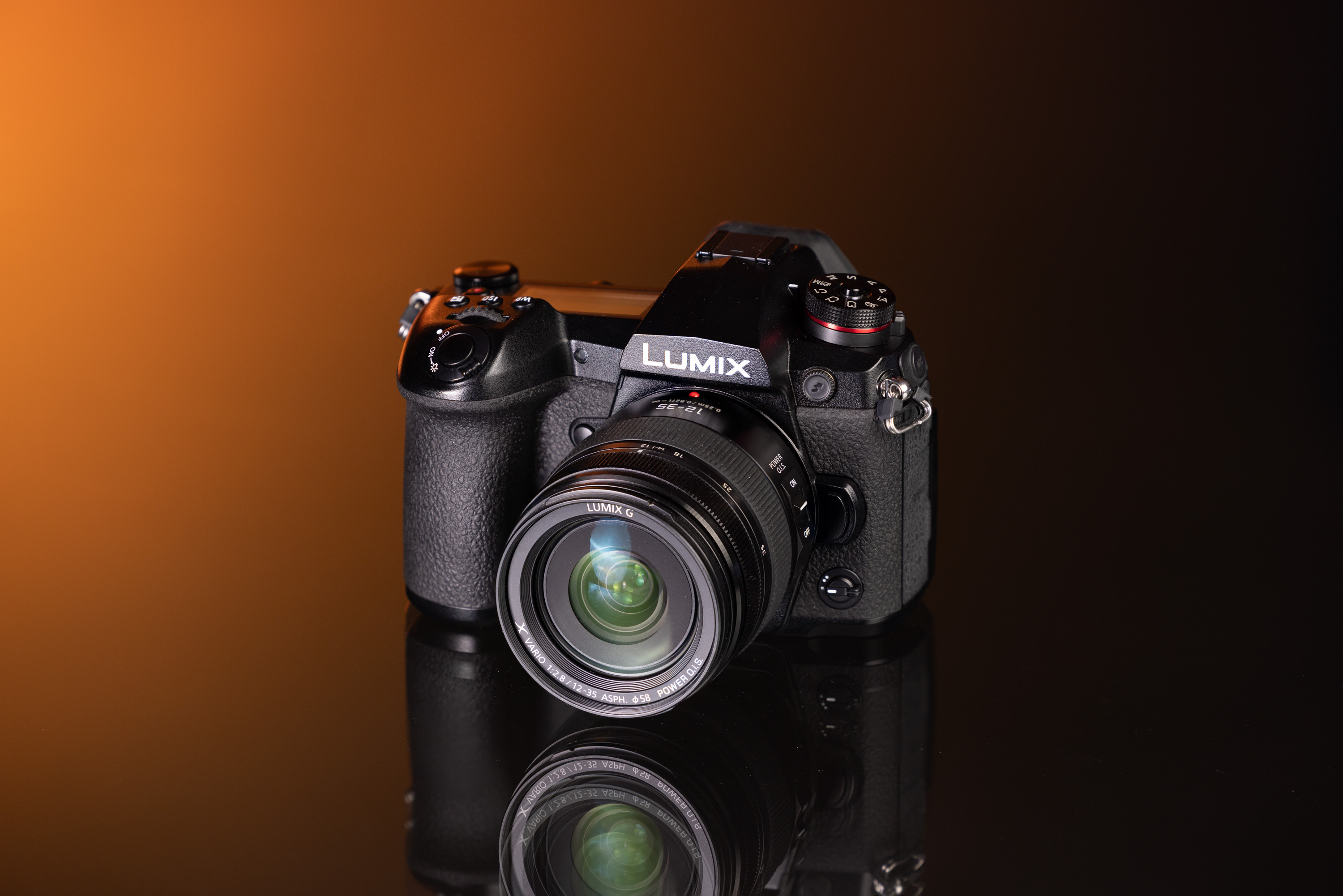 Used Panasonic DC-G9 and Panasonic Lumix G X Vario 12-35mm f/2.8 II ASPH Power O.I.S on an orange and black background