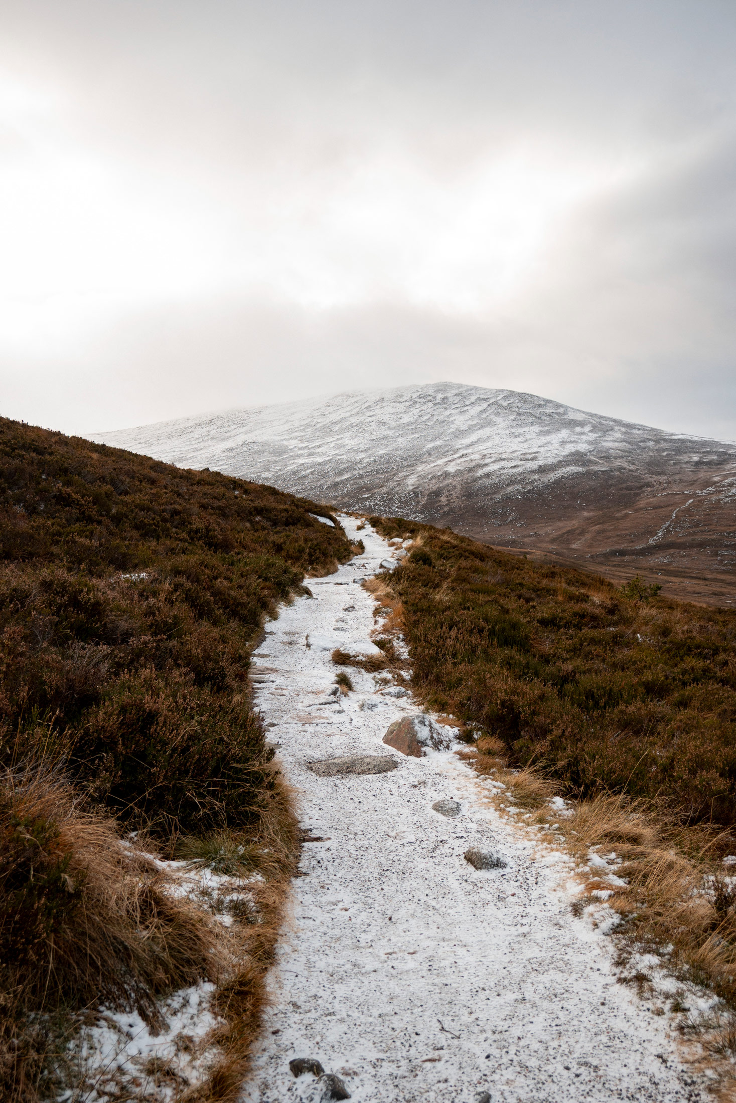 Snowy pathway on a mountaintop in Scotland, taken on a Canon PowerShot V1 by Kristi Townsend.