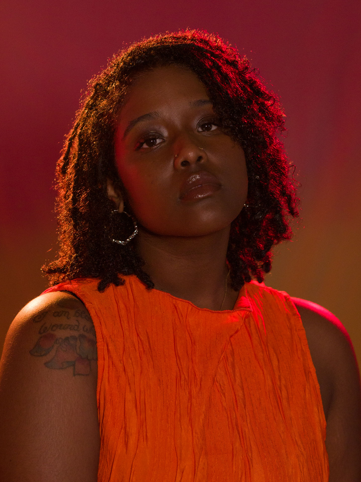 Portrait of a person using rim lighting with a fill light by Kaylah Sambo on a Hasselblad X1D-50c.