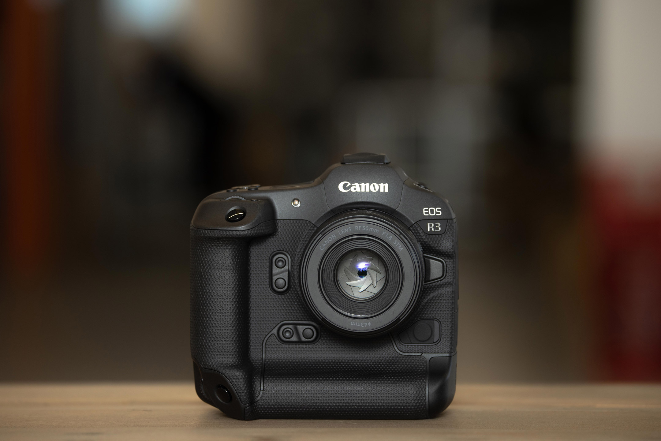 Canon EOS R3 on a wooden table