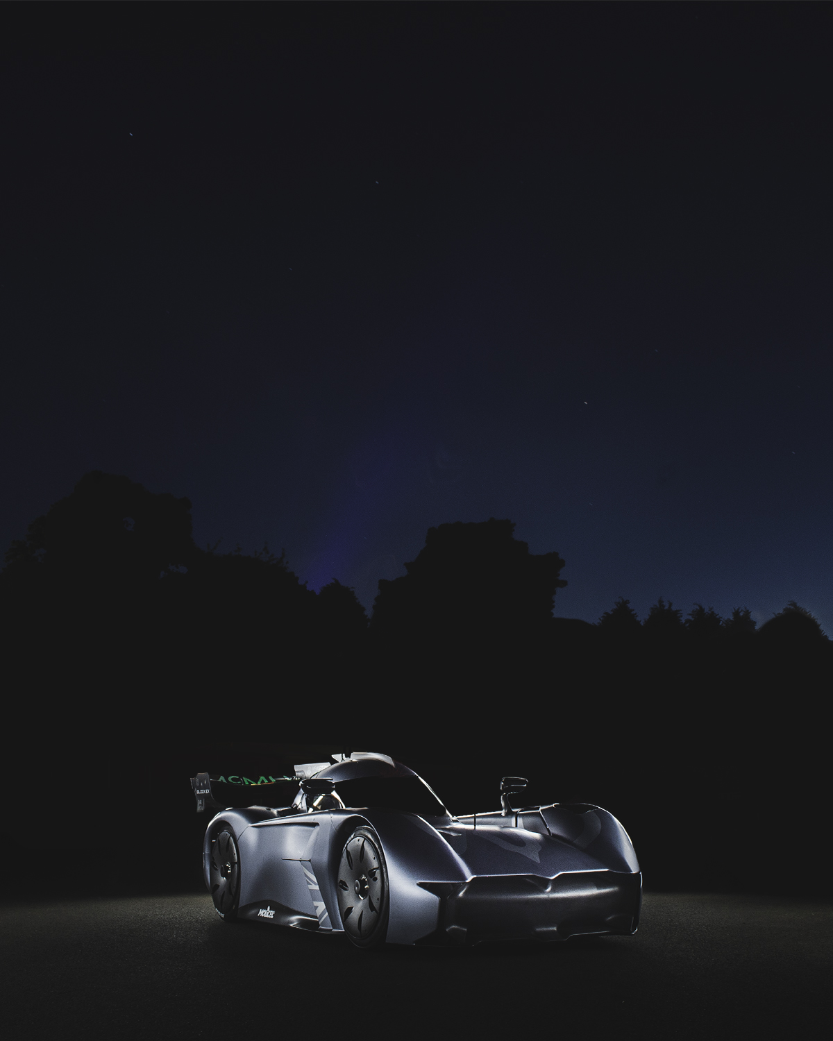 The McMurtry Automotive Speirling at night, shot with a Tokina 28-80mm f/2.8 lens at 28mm