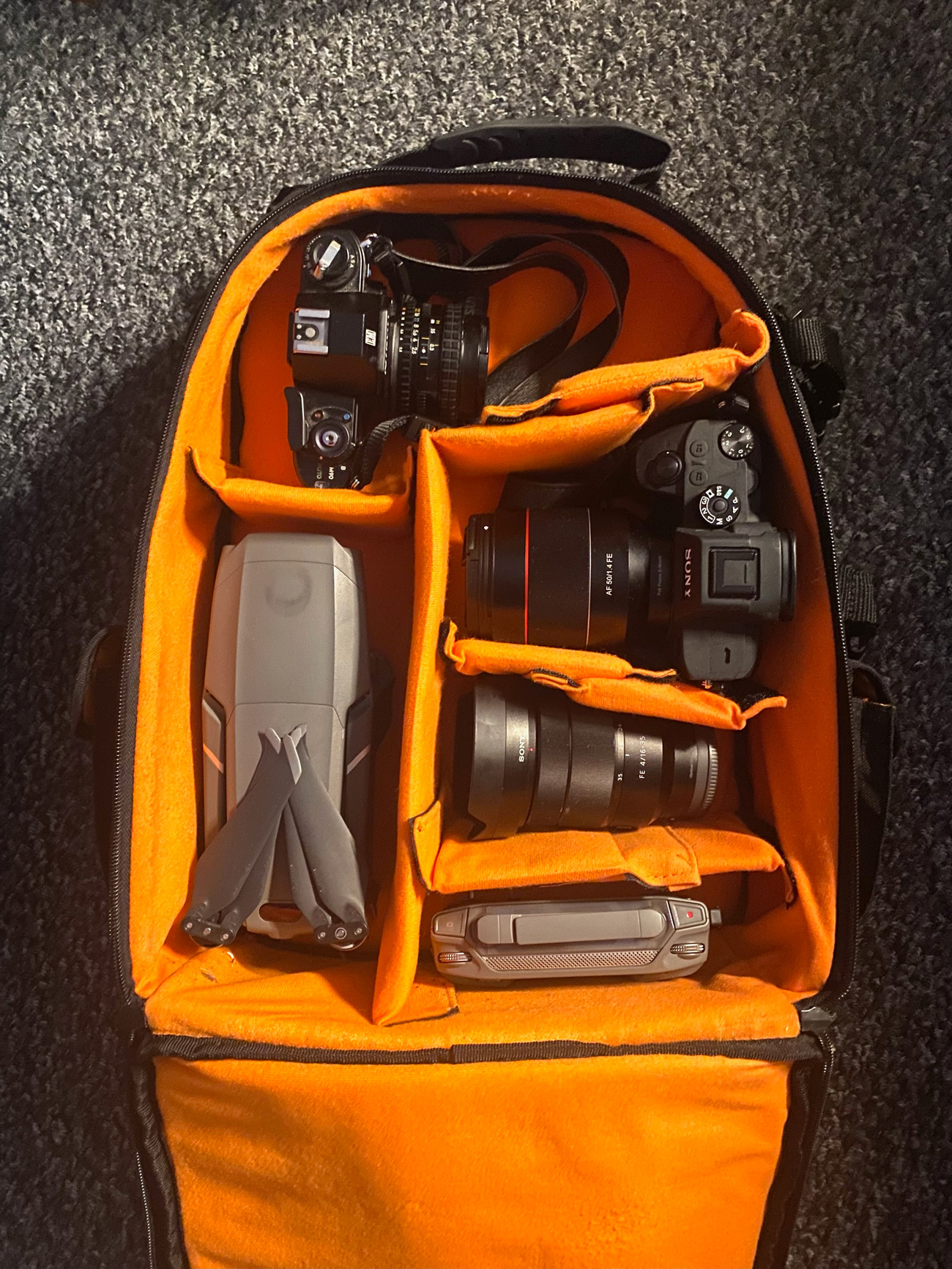 Photo of DJI Mavic 2 Pro, Sony A7R III, Zeiss 16-35mm f/4 and Samyang 50mm f/1.4 in a kit bag