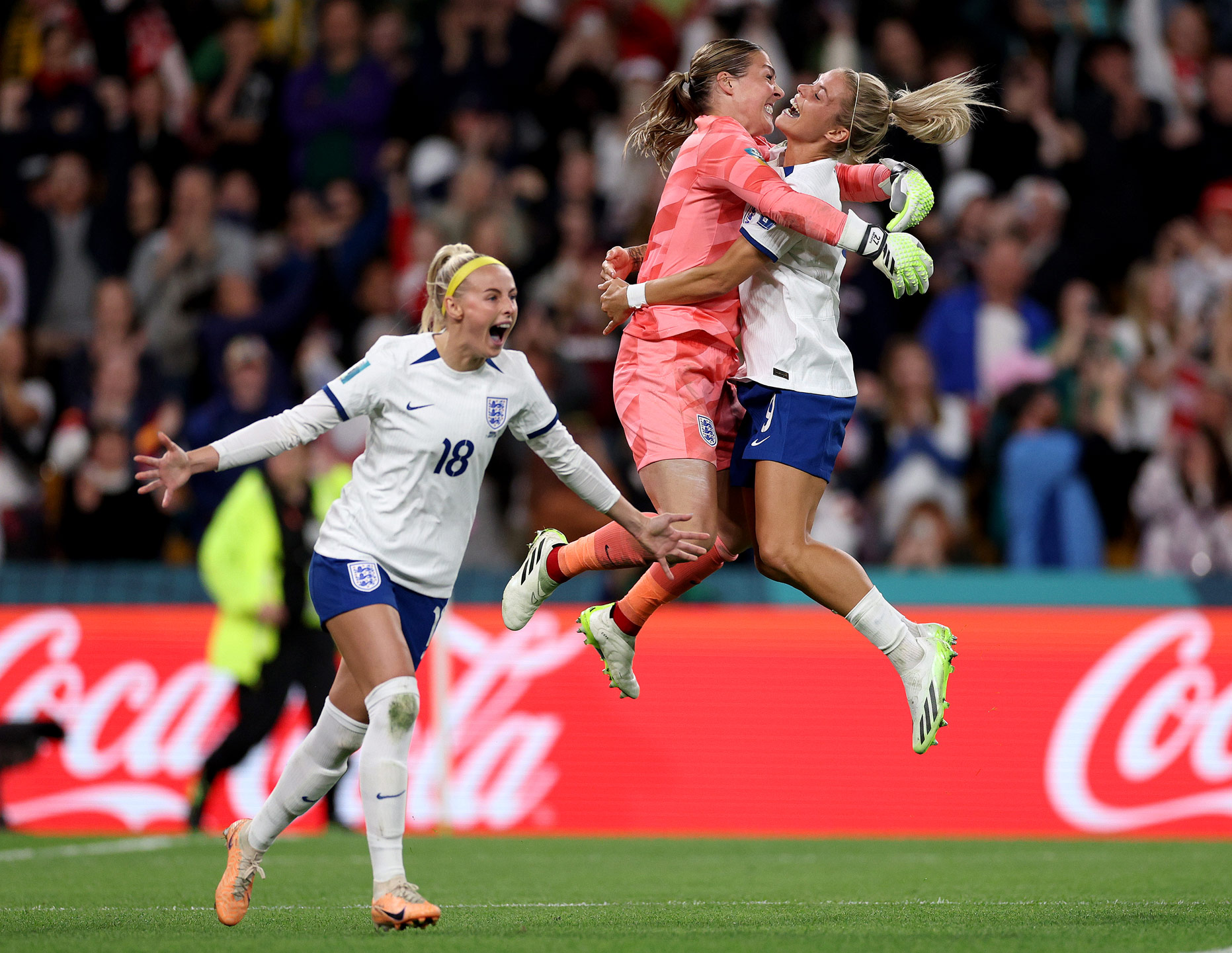 Chloe Kelly and teammates Rachel Daly and Mary Earps of England celebrate after scoring her team's fifth and winning penalty in the penalty shoot out during the FIFA Women's World Cup Australia & New Zealand 2023. Photo by Elsa Garrison on a Canon EOS R3.