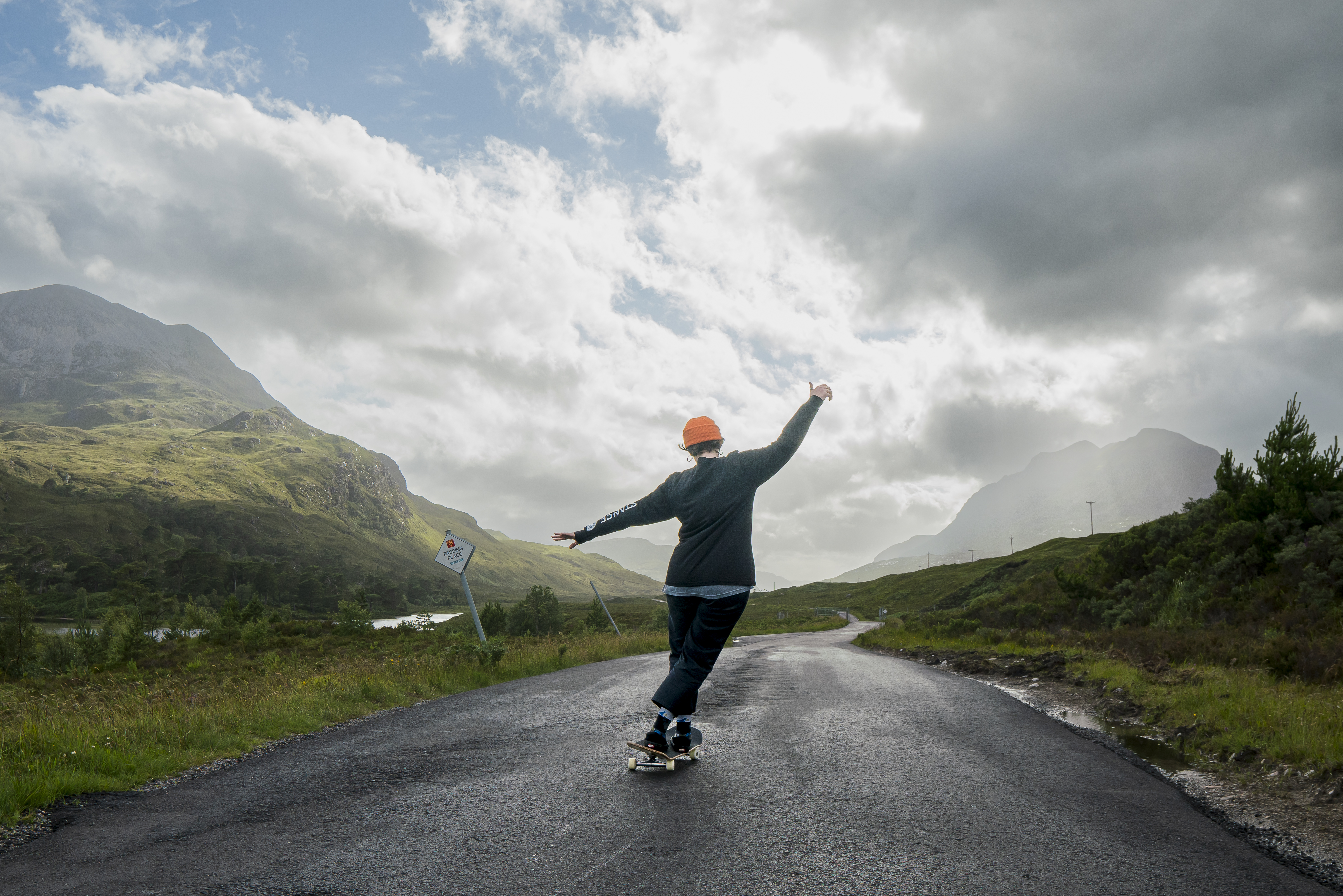 Skateboarder in the Scottish Highlands 