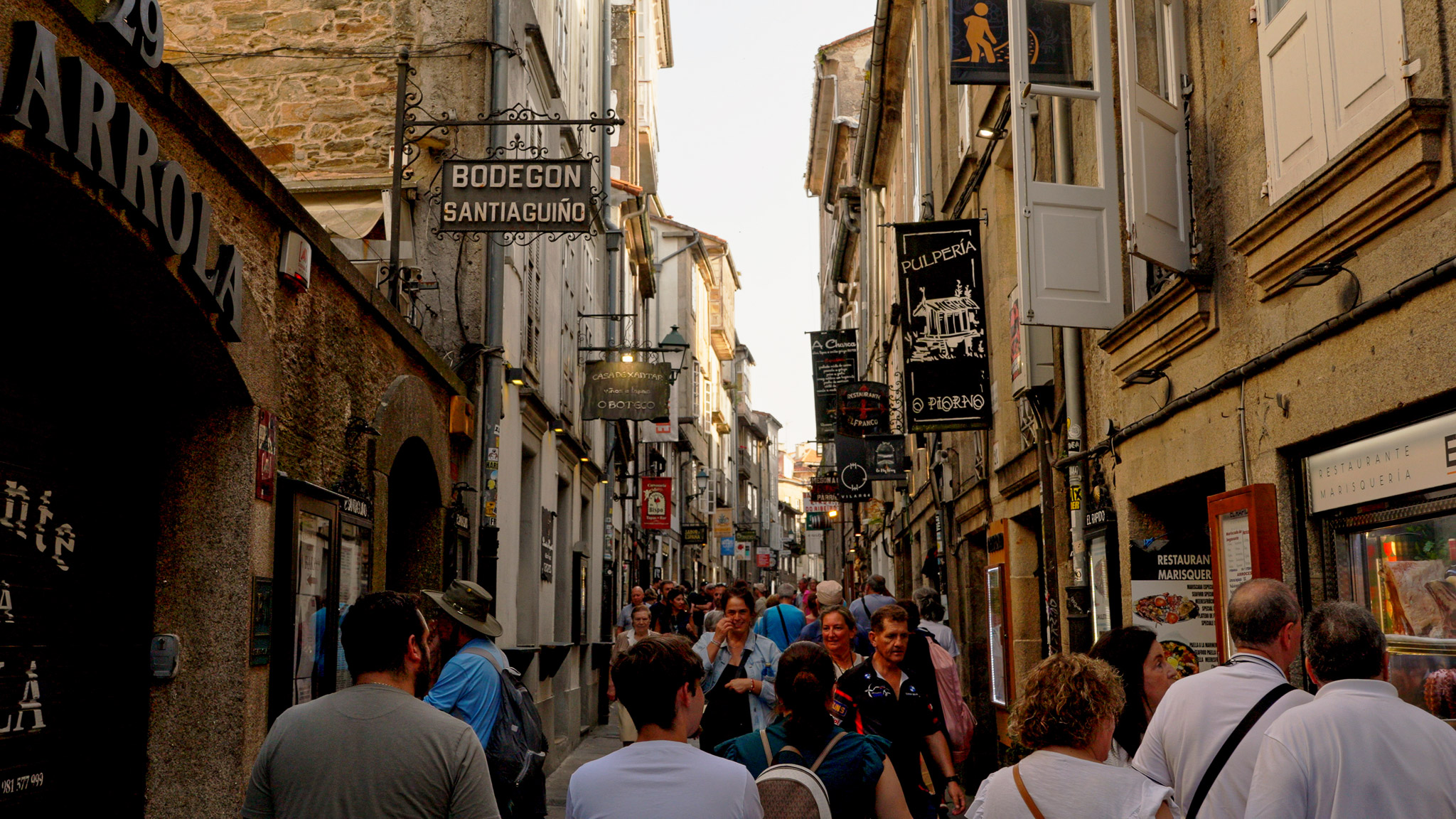 A frame grab from Sony A7C II video showing a crowded street in Santiago, Spain. Taken by Connor Redmond on the Sony A7C II. 
