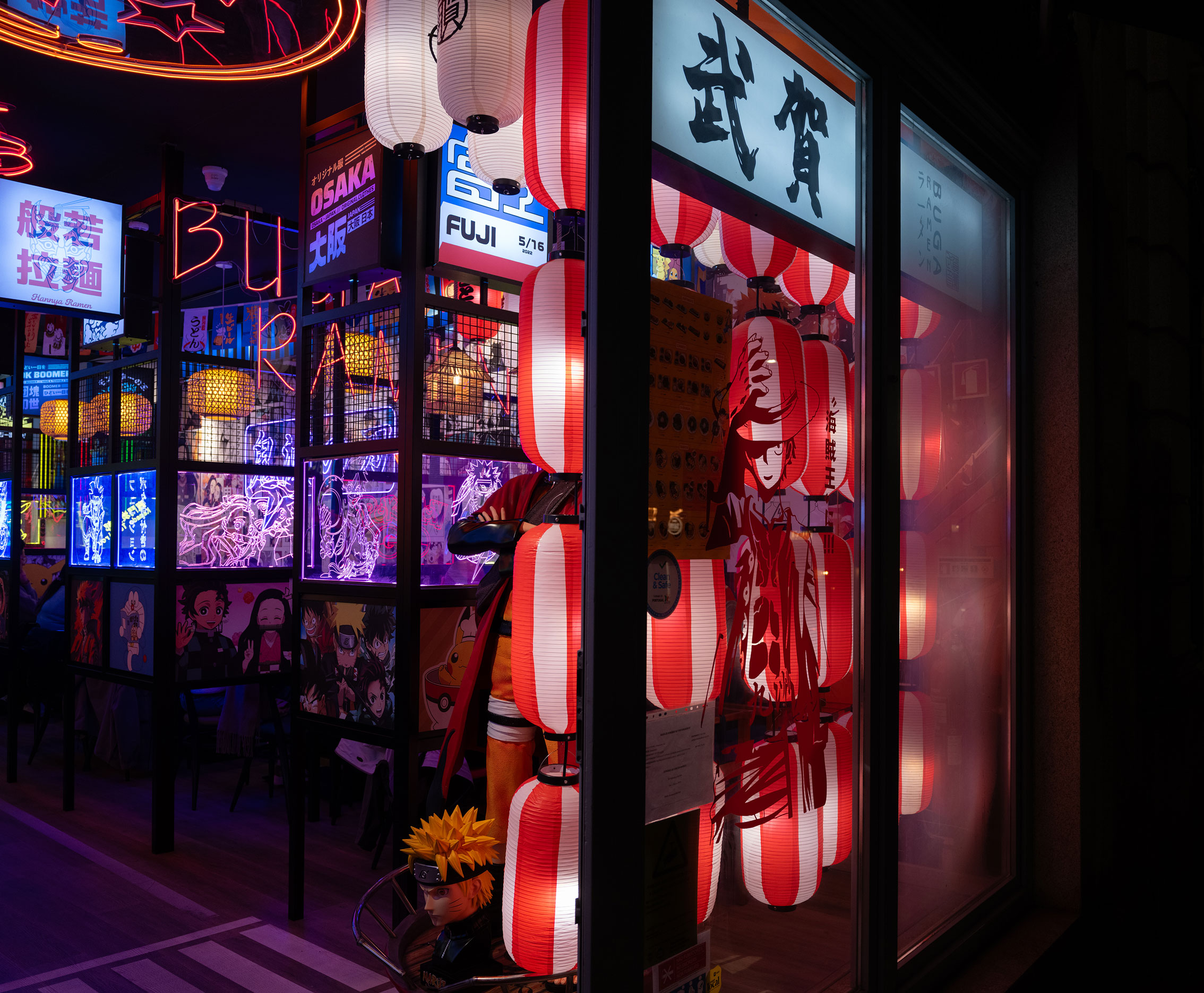 Neon lights in shopfront at night. Shot on the Fujifilm GFX100RF by Amy Moore.