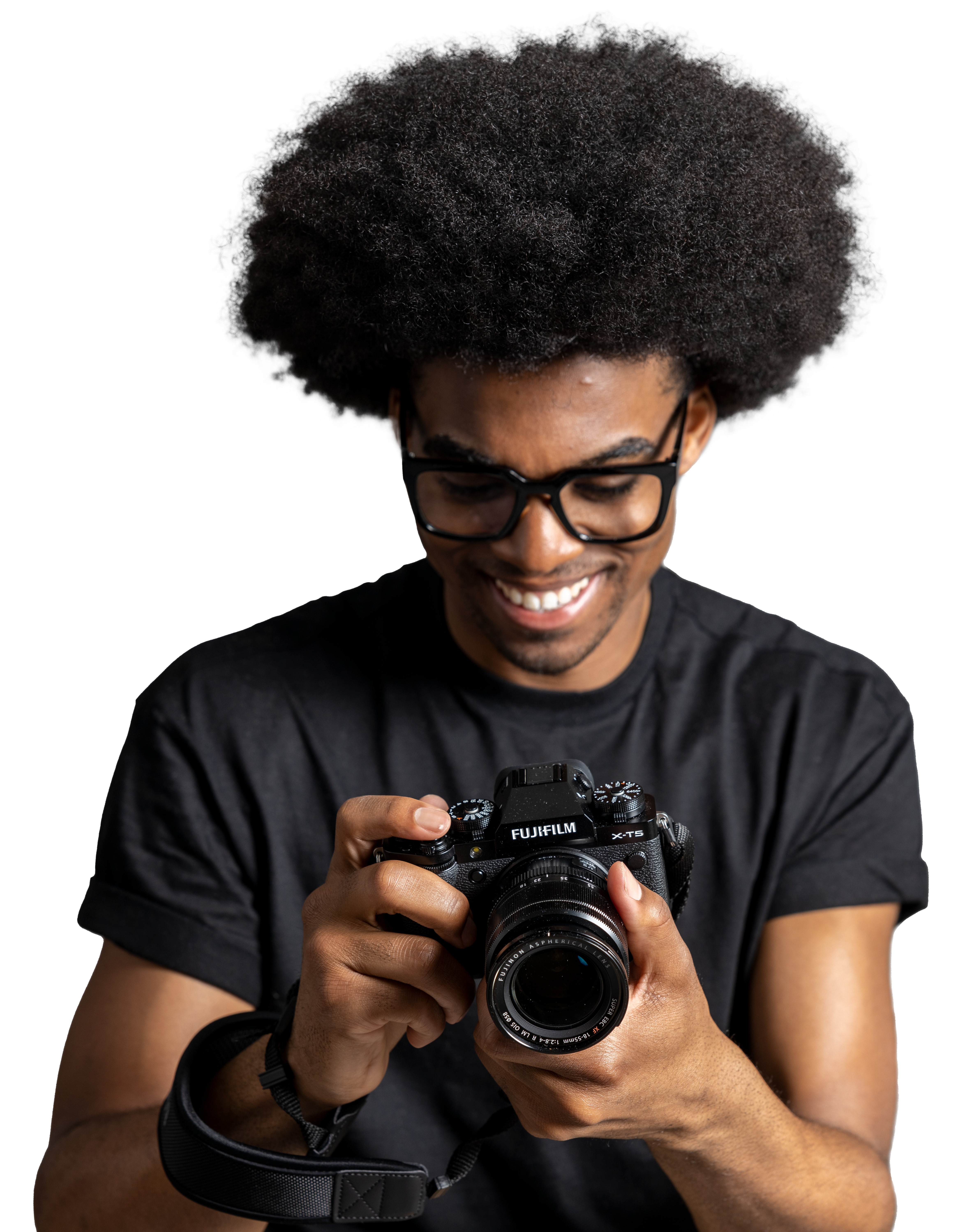 Cutout (PNG) of a photographer in a black shirt smiling and holding a Fujifilm camera
