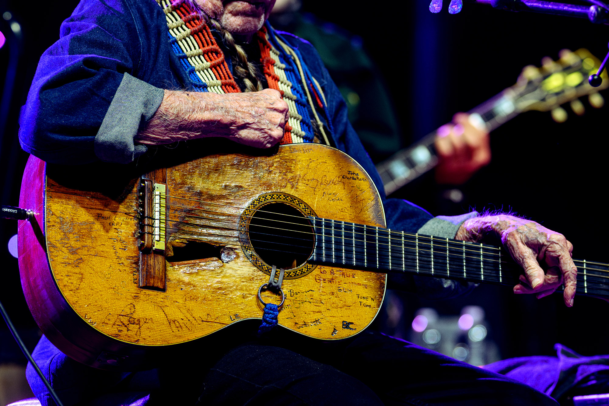 Willie Nelson's guitar up on stage during performance, photo by James Joiner on a Nikon Z9.