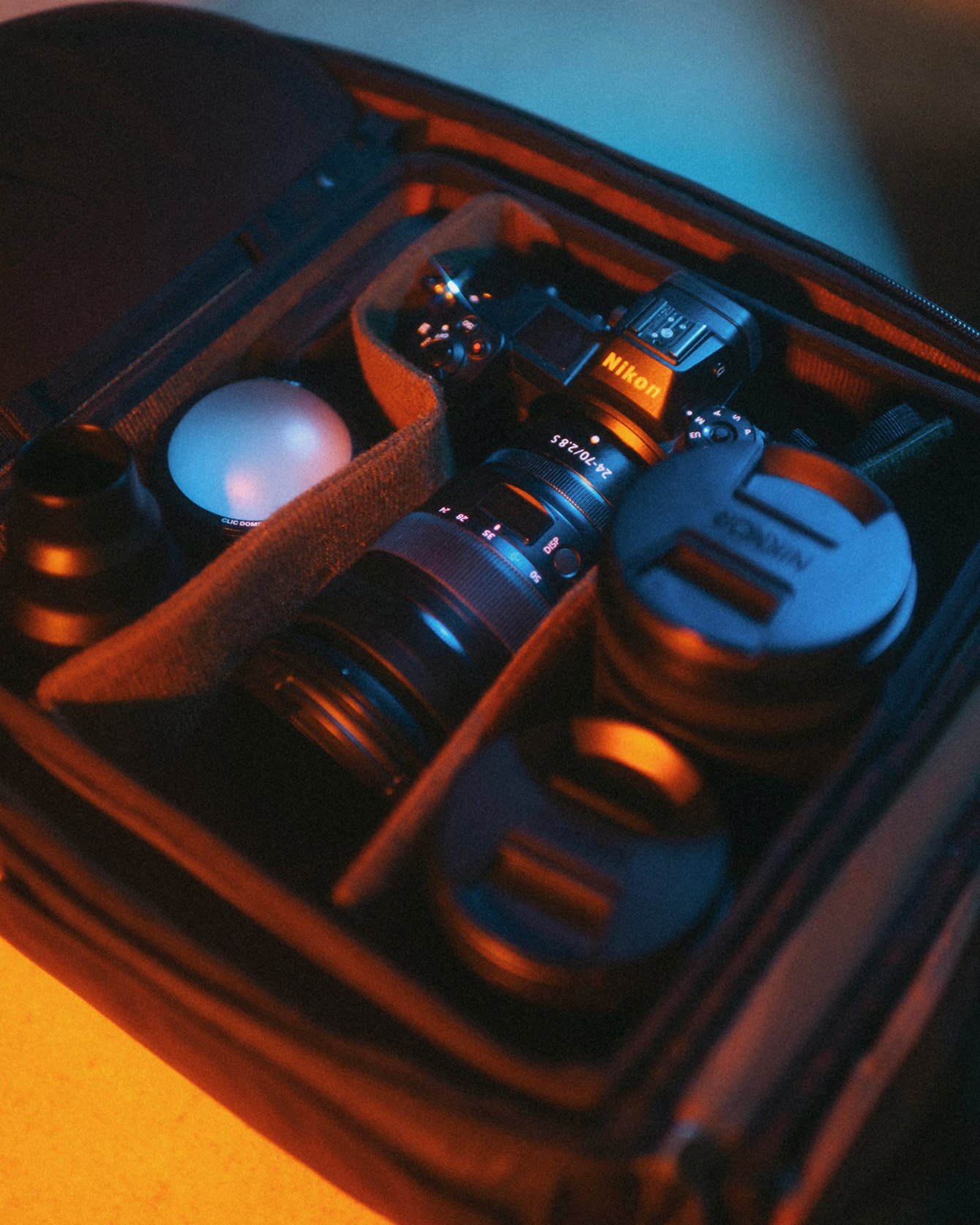 Gear bag with Nikon camera and Nikkor lenses, photo by Brandon Woelfel