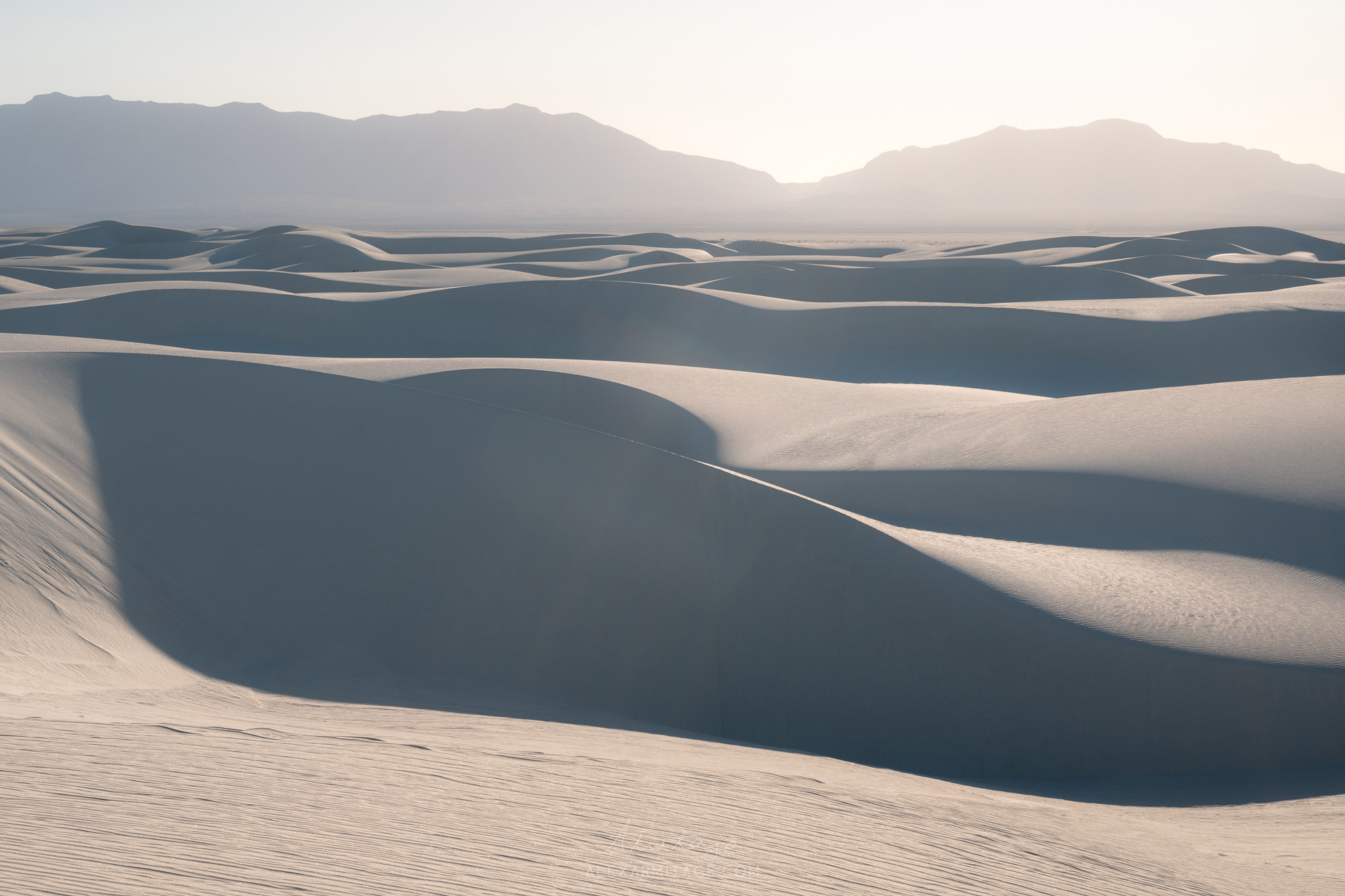 Landscape of rolling sand dunes in White Sands National Park in New Mexico, USA, taken by Alex Armitage on a Nikon Z8. 