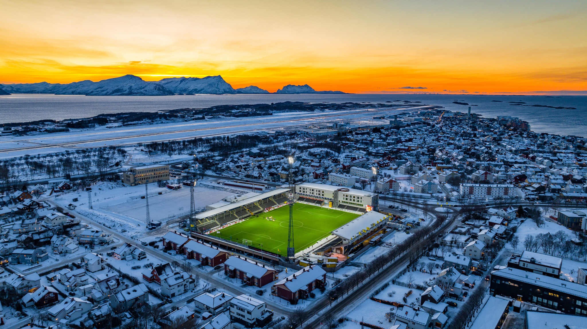 
A remote football pitch in Norway at sunset in a very snowy landscape. By Jan-Petter Dahl.

