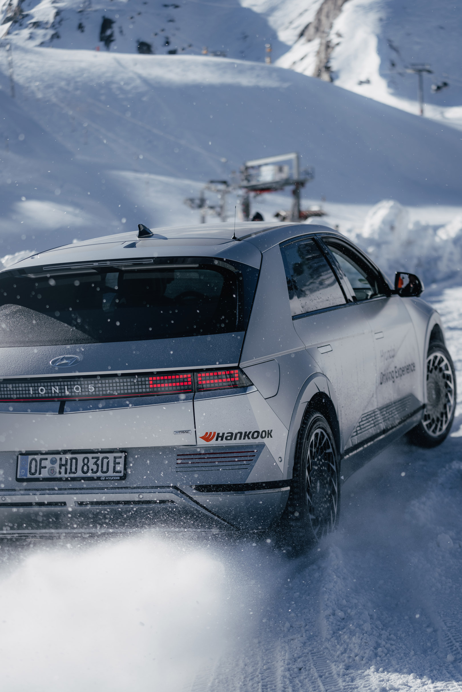 Silver Hyundai in motion on snow in Austria on a glacier