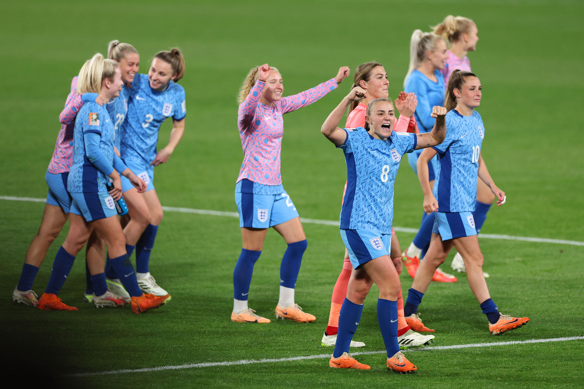 Georgia Stanway (England) and teammates celebrate victory against Australia during semifinals of 2023 FIFA Women’s World Cup. Photo by Elsa Garrison on a Canon EOS R3.