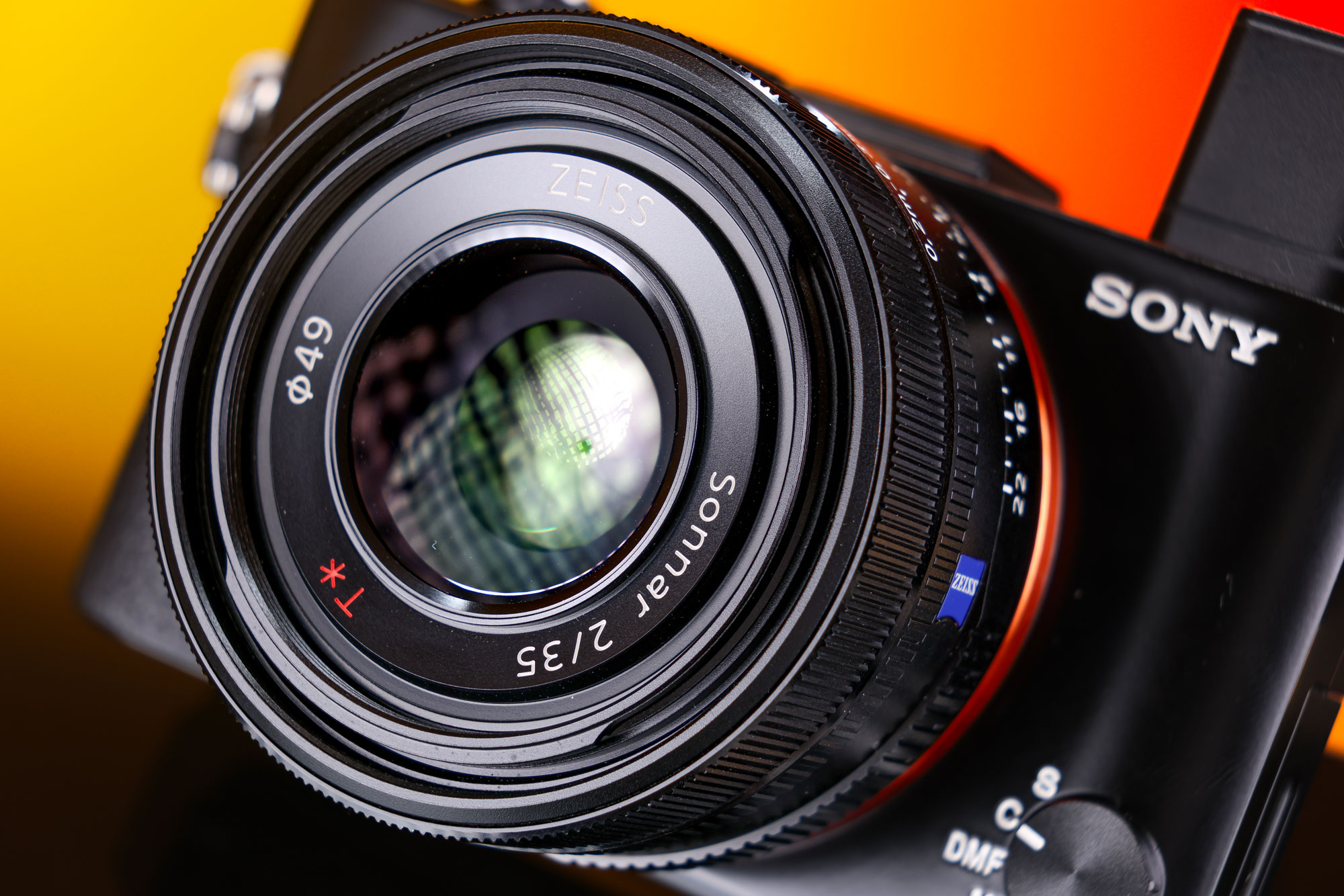 A close-up of the ZEISS Sonnar T* 35mm f/2 lens on a Sony Rx1R II Lens Close up