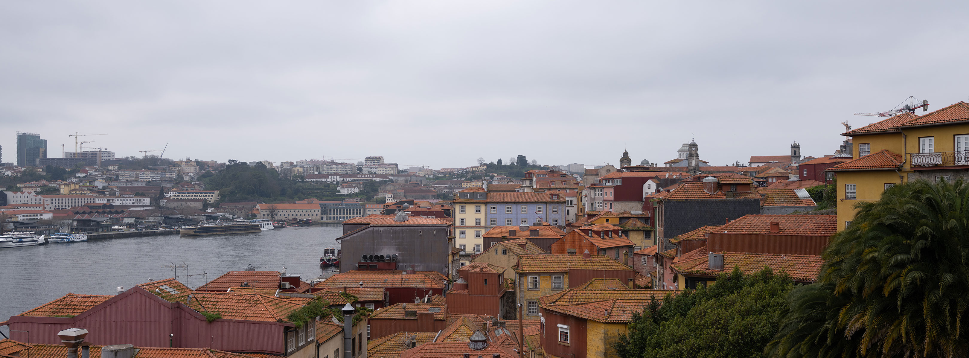 65:24 crop of rooftops in Porto, Portugal. Shot on the Fujifilm GFX100RF by Amy Moore.