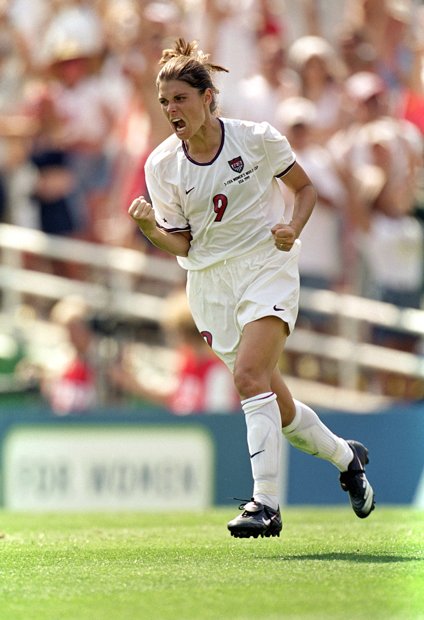 US player Mia Hamm celebrating a converted penalty kick against China during the 1999 Women’s World Cup final in Pasadena, California, US, film photo by Elsa Garrison