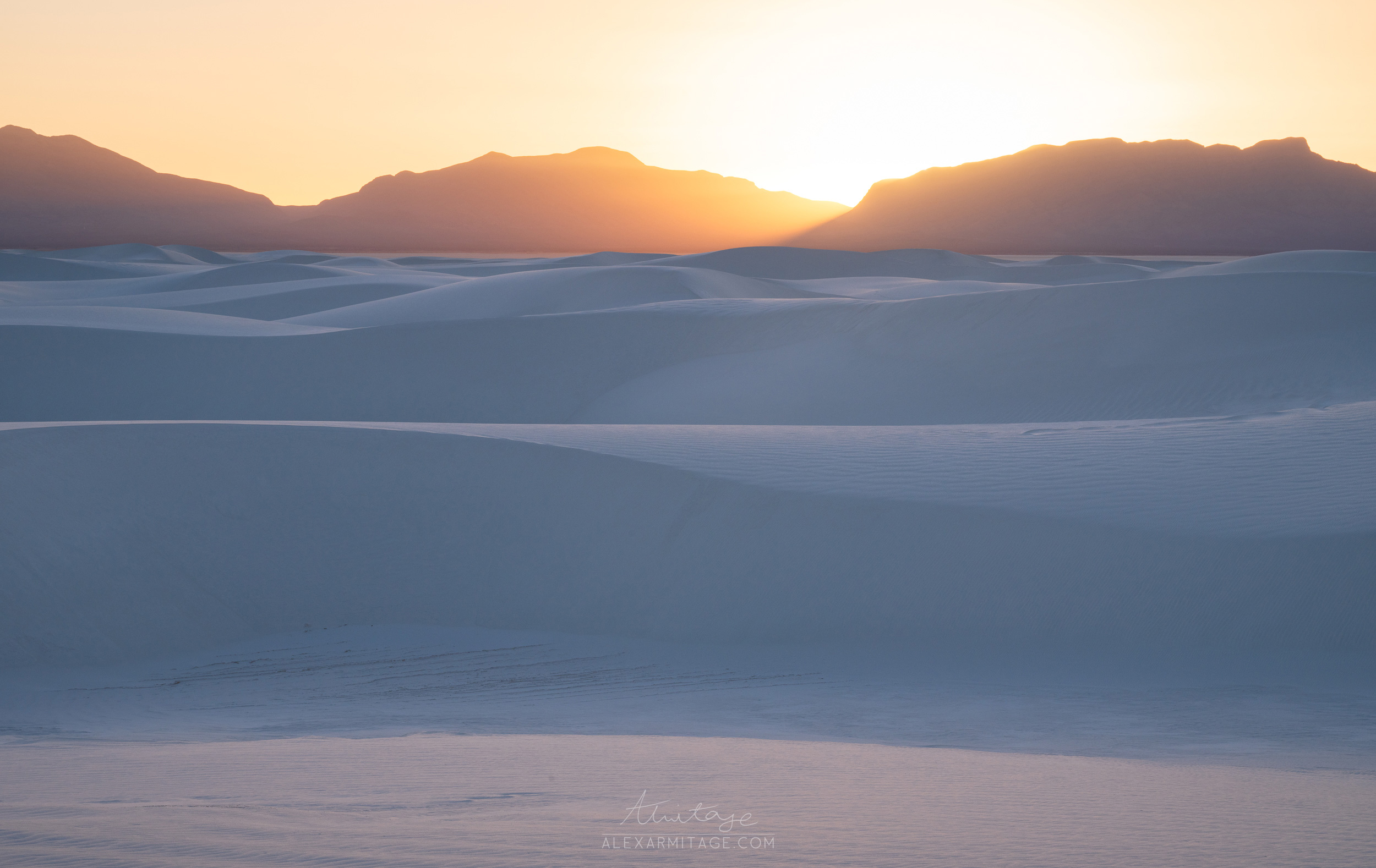 Sunset at White Sands National Park with rolling sand dunes in New Mexico taken by Alex Armitage on a Nikon Z8. 
