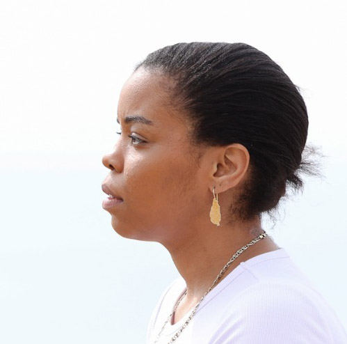 A side-on portrait photo of Leeonda Alfred
