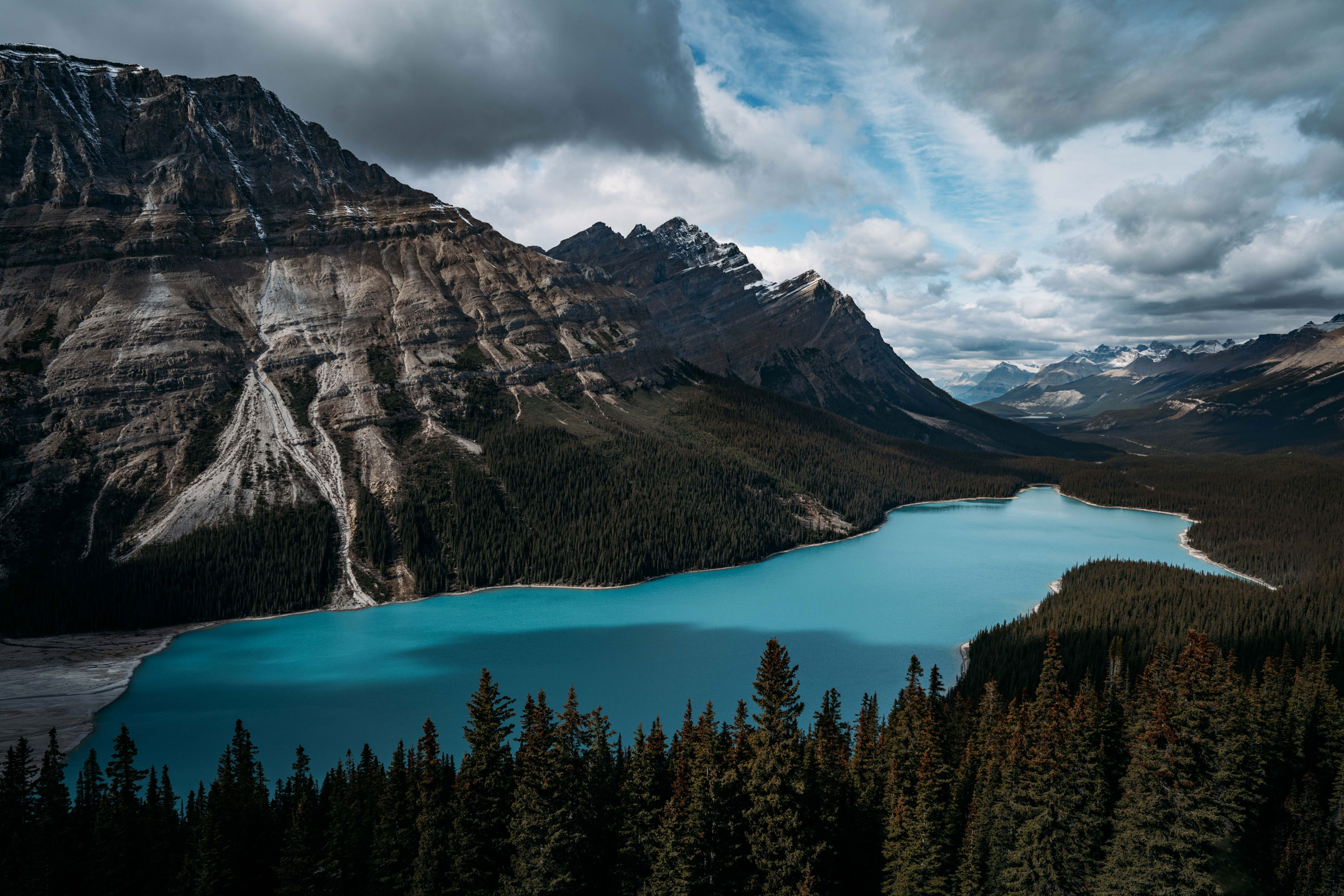 Peyto Lake in Banff National Park with mountains in backdrop, photo by Jude Allen.