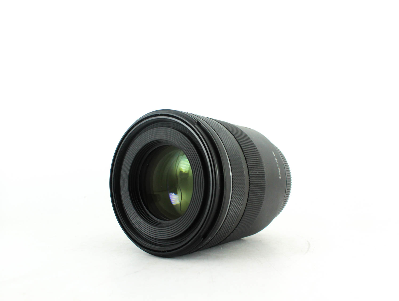 Image of the Canon RF 85mm f/2 Macro IS STM lens on a white background.