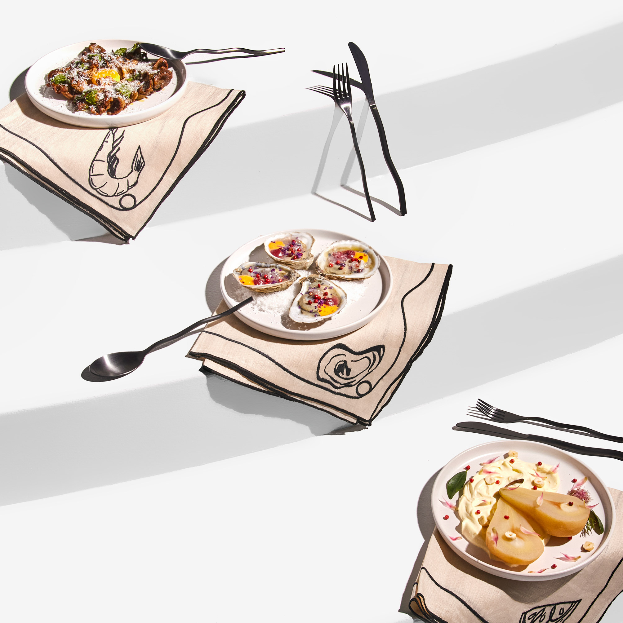 Elegant food spreads on a white background.