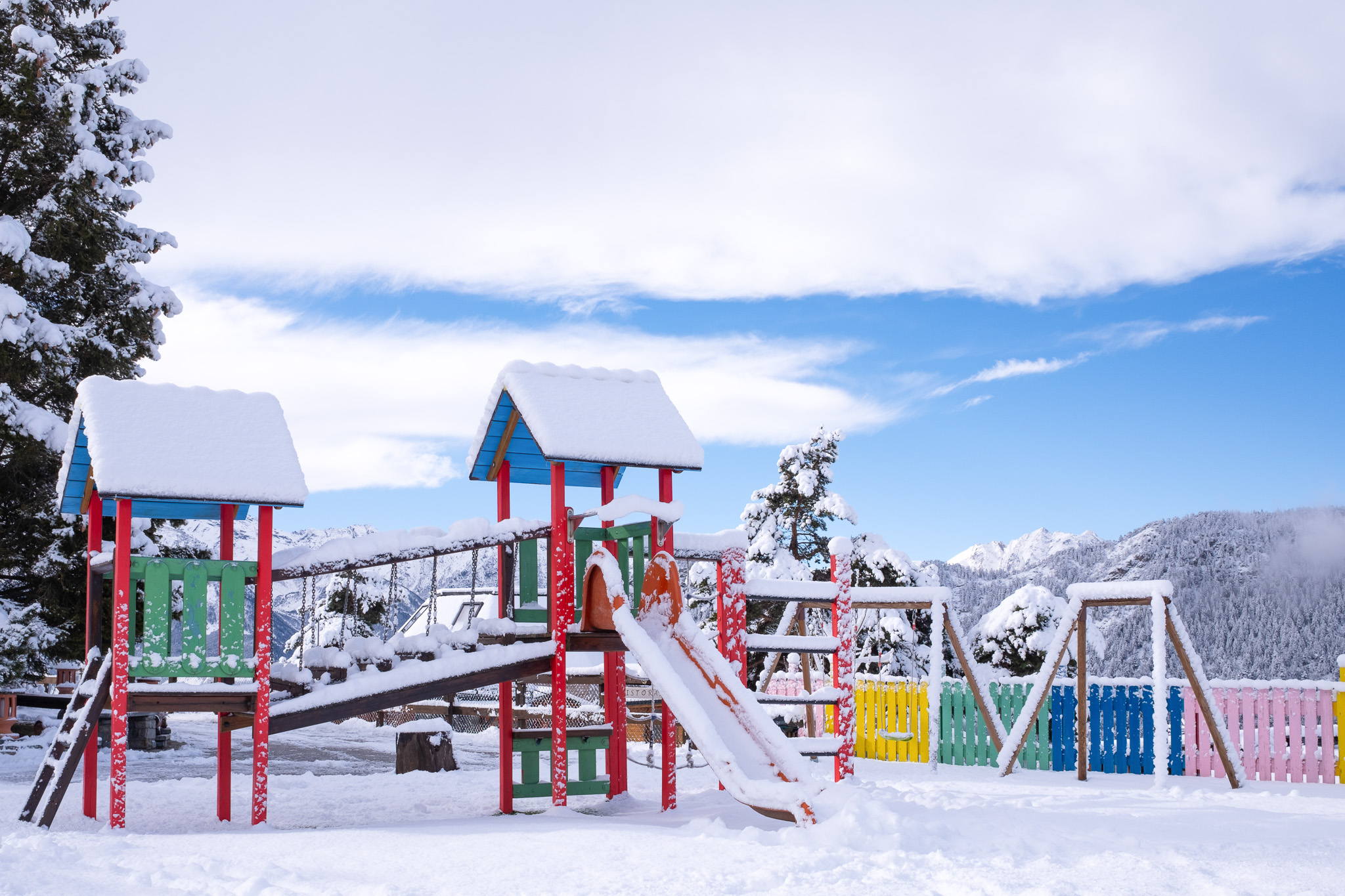 A bright kids’ playground in a ski resort in the Italian Alps. Taken on the Fujifilm X100VI by Amy Moore.