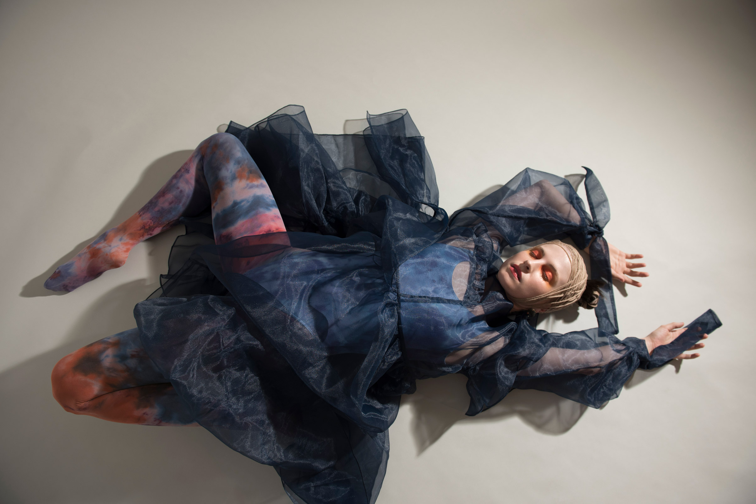 Photo of singer Hayley Williams of Paramore lying on the ground wearing a blue dress and patterned tights.

Nikon D750 | Nikon Nikkor Z 24-70mm f/2.8 S | 24 mm | f/3.5 | 1/200 | ISO 200 