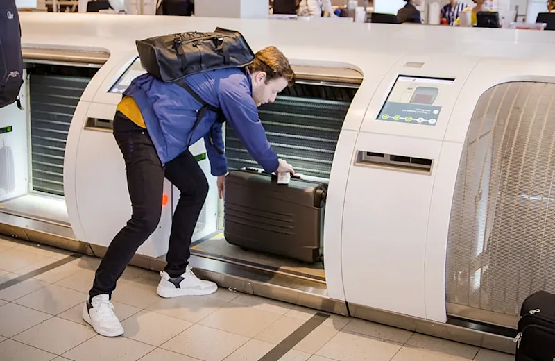 bagage in automaat plaatsen