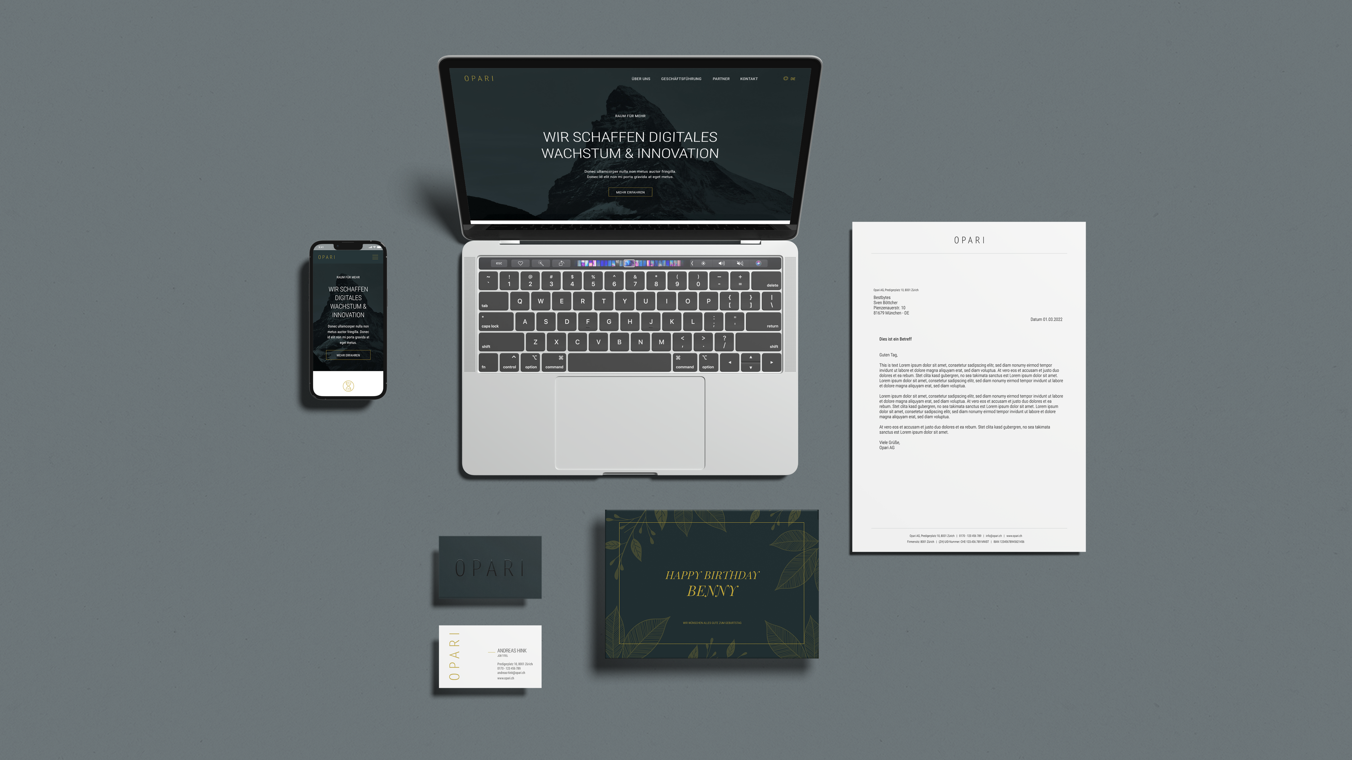Laptop and smartphone with the Opari website, along with print elements such as business card, letterhead, and card Laptop and smartphone with the Opari website, along with print elements such as business card, letterhead, and card