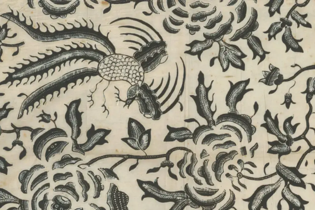 Un tissu Vlisco ancien indigo et blanc à motifs de fleurs