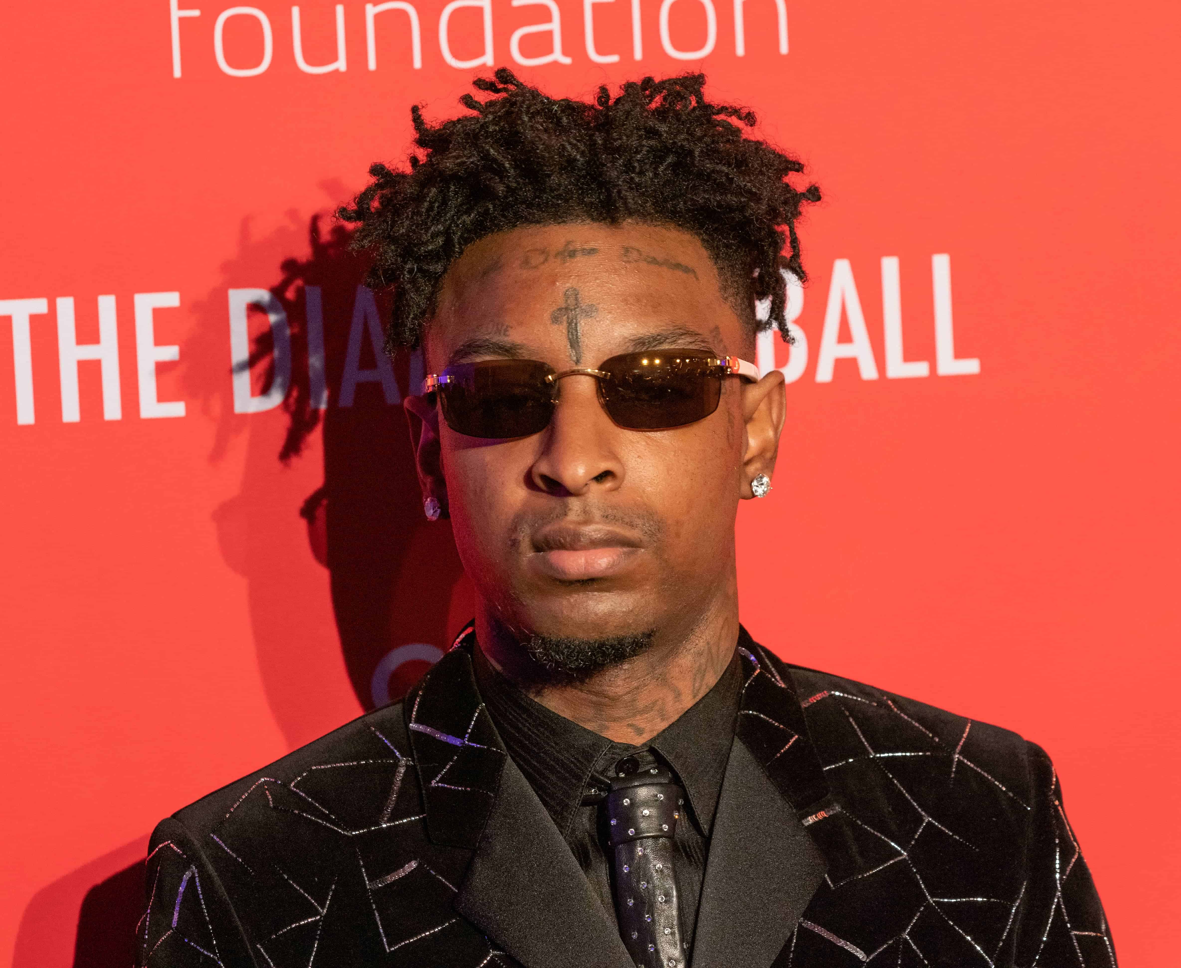 21 Savage Flexes Brand New Smile + Claps Back At Fans Who