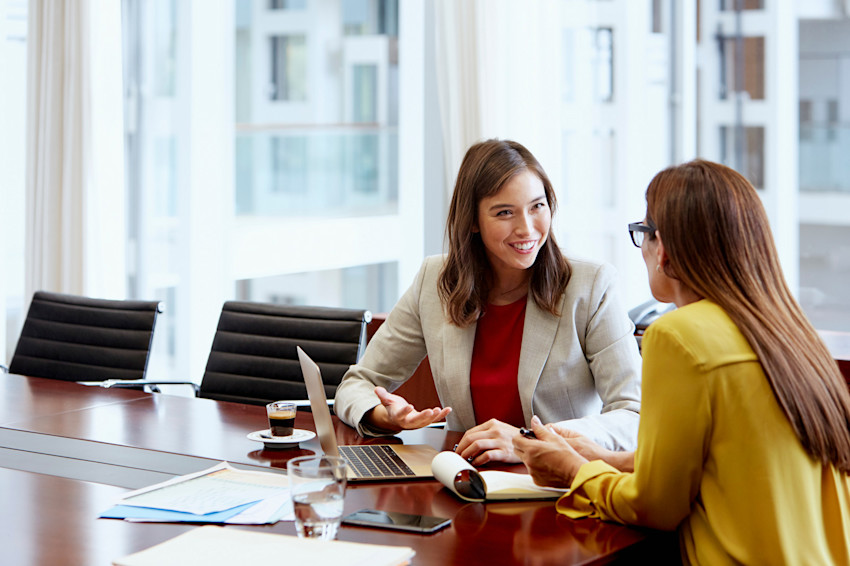 Two women in office with computer