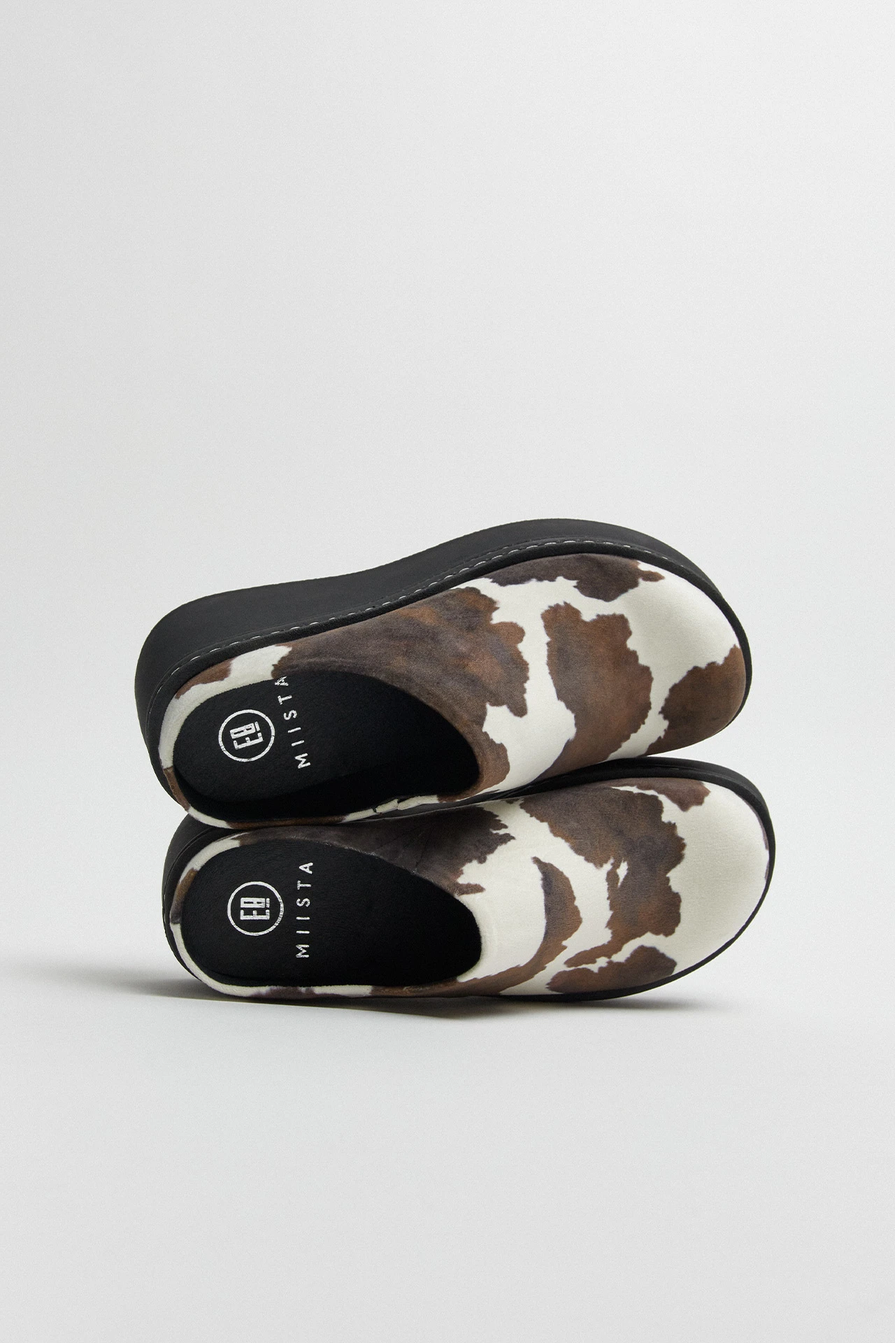 E8-kristi-cow-print-mules-03