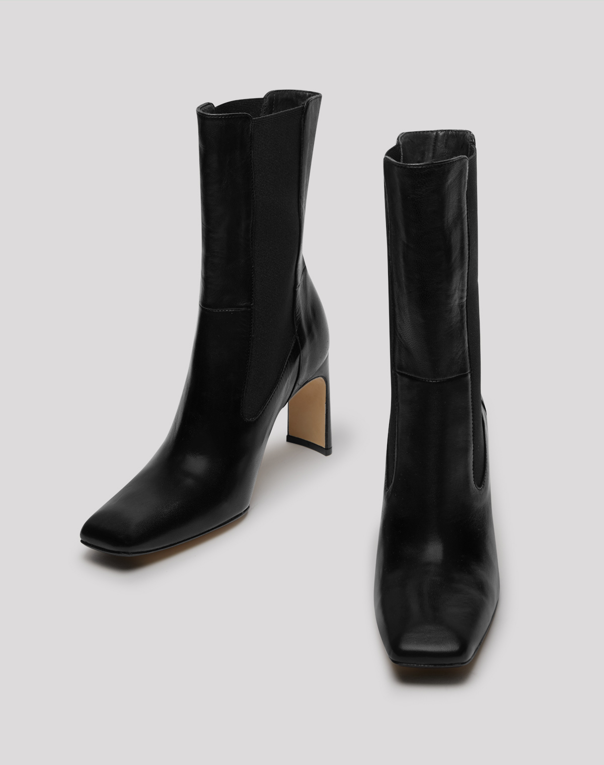 black leather slip on boots