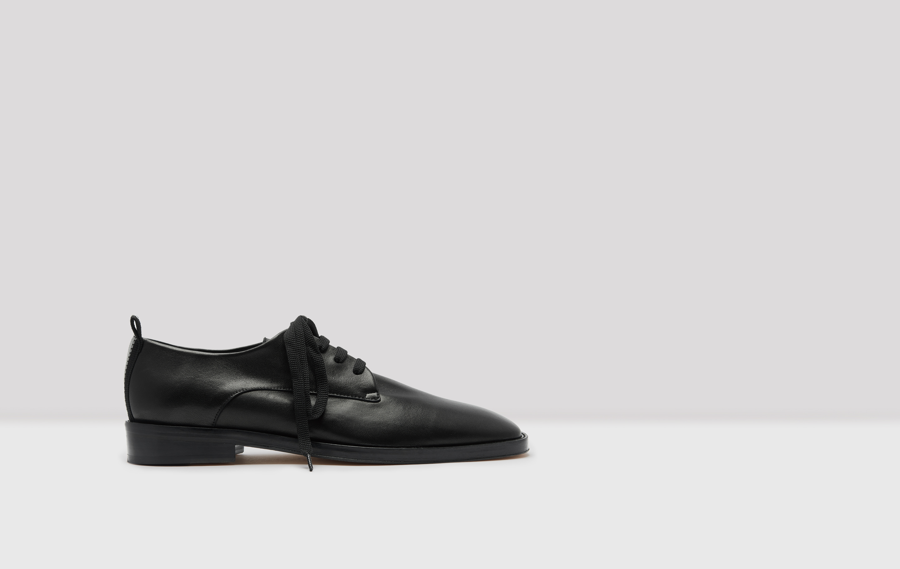black leather soled shoes