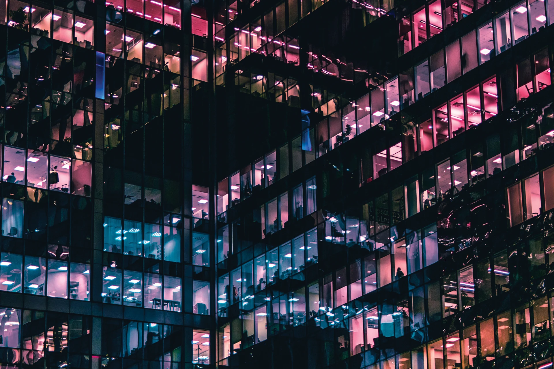 Illuminated office building showcasing a modern workspace environment