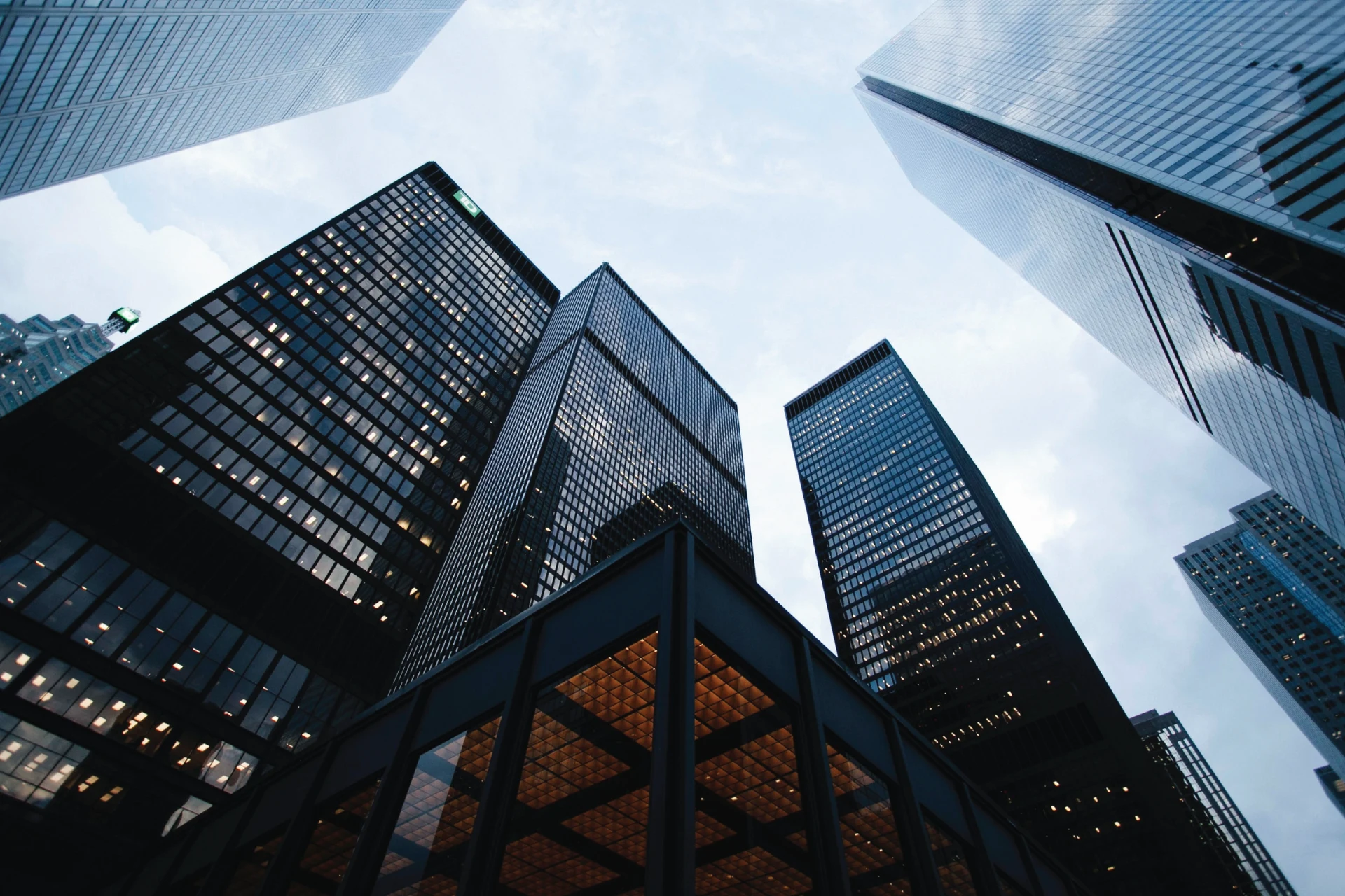 View of tall skyscrapers from ground perspective in an urban setting