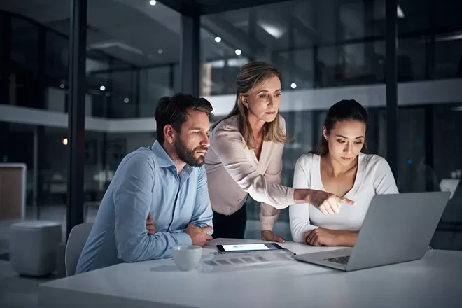 Employee creating digital twin models for real-time factory monitoring