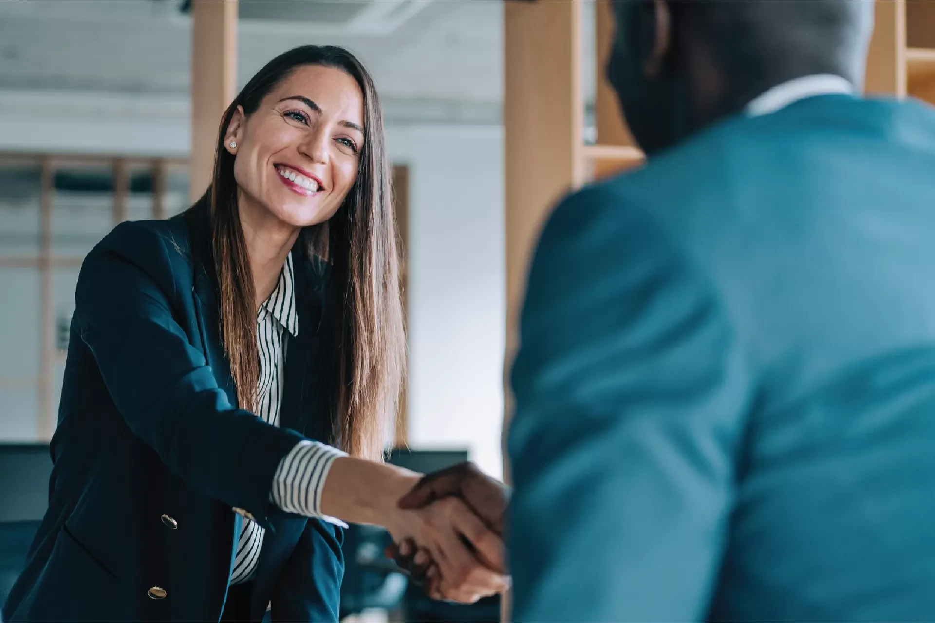 Professional business handshake for AAA ClauseBuilder AI dispute resolution