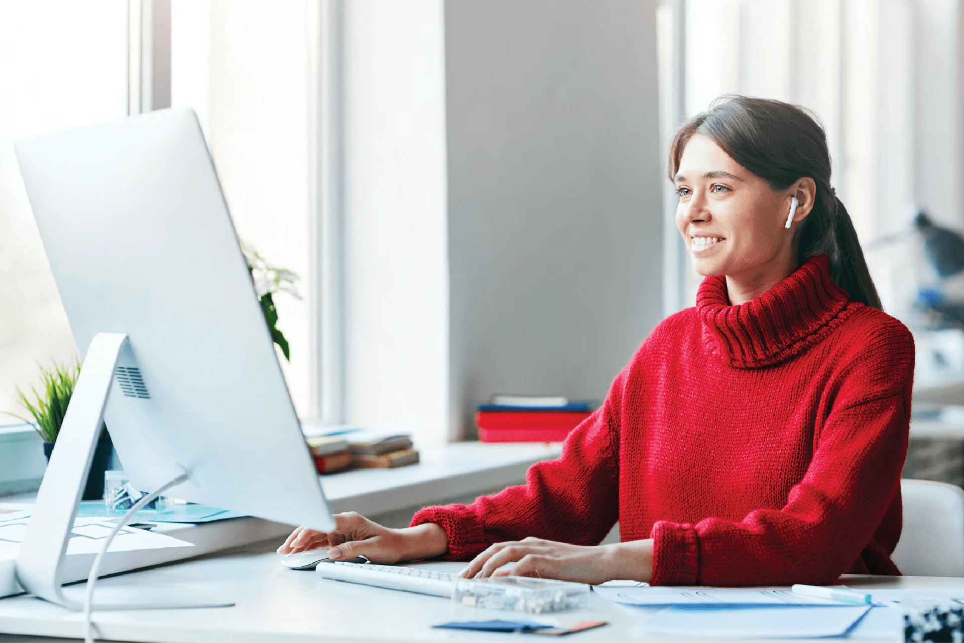 Professional working on a computer, enhancing user experience for surveyors