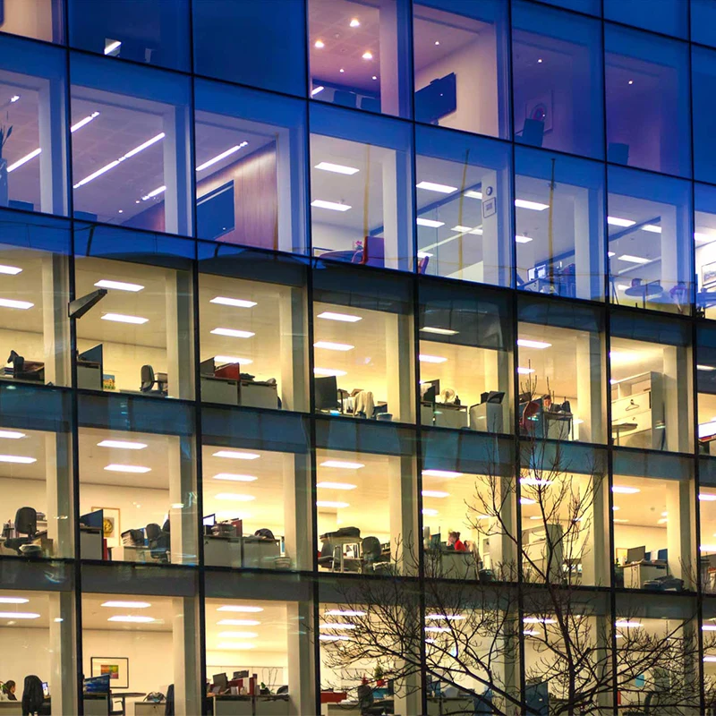 Office view showing multiple workstations in a modern corporate building