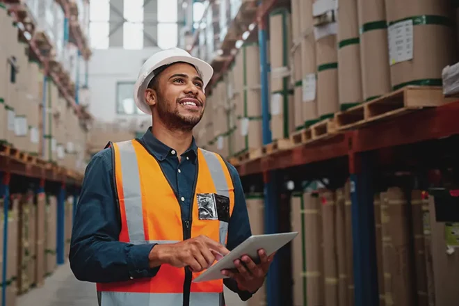 Employee working on blockchain for secure supply chain in smart manufacturing