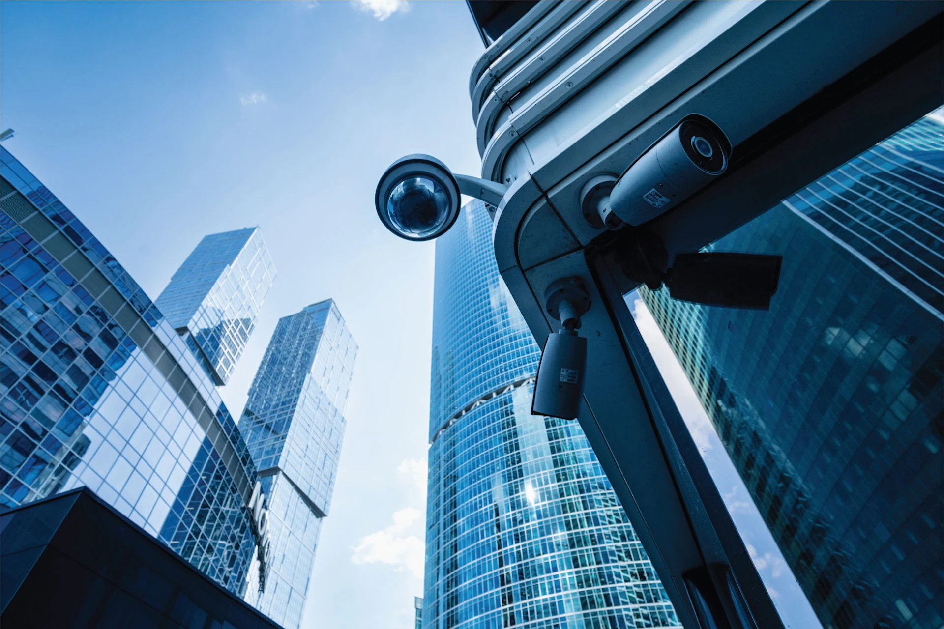 Security cameras at a modern building in a US city