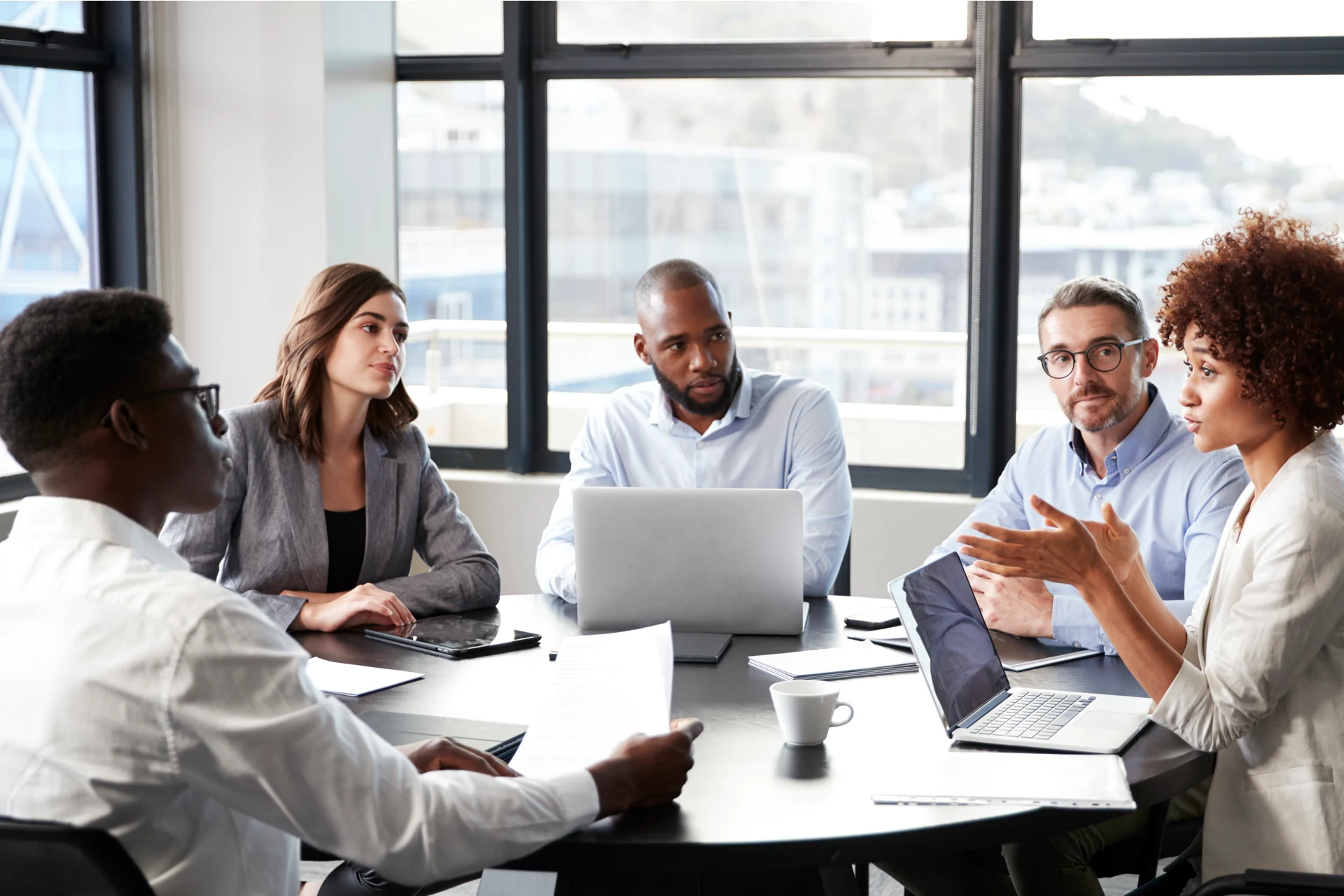 Team meeting discussing strategies for Work.com implementation