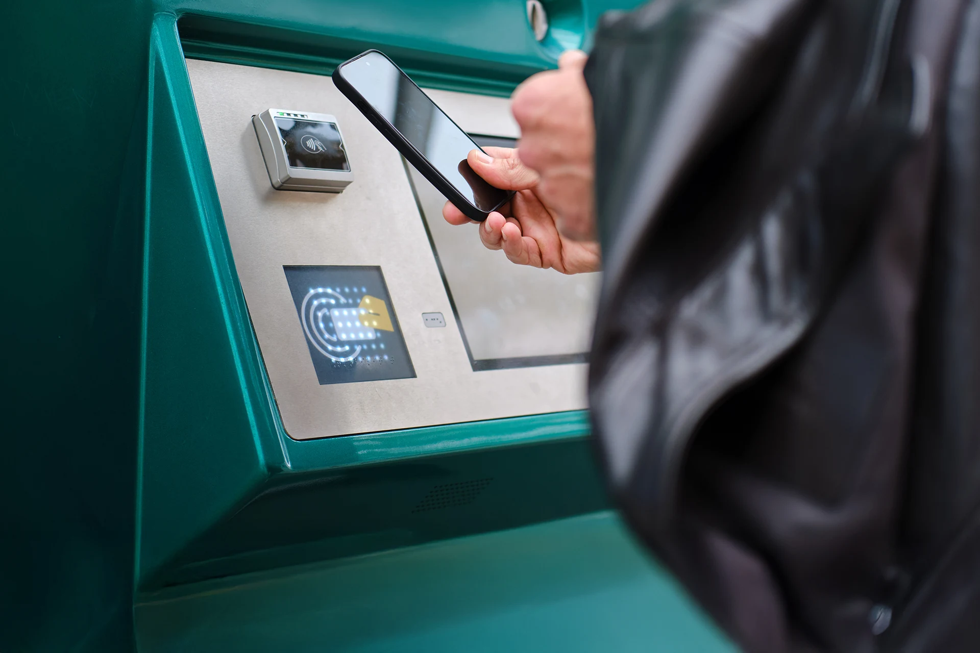 User interacting with a payment terminal at Standard Bank in South Africa