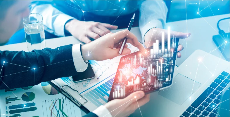 Two tech professionals examining blockchain contract management data on tablet